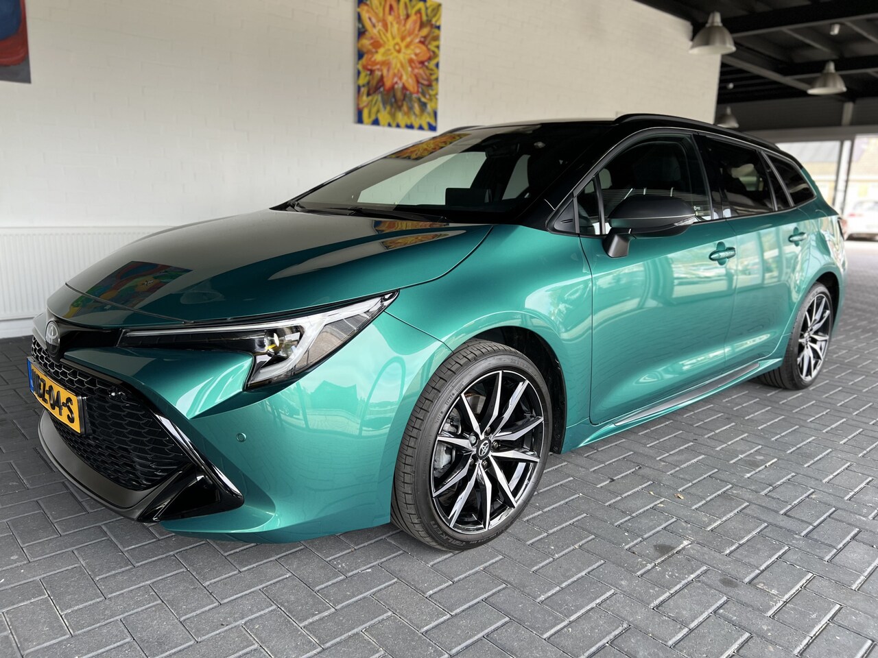 Toyota Corolla Touring Sports - Hybrid 200 GR Sport Plus / Apple Carplay / Stuurverwarming / Adaptive Cruise Control - AutoWereld.nl