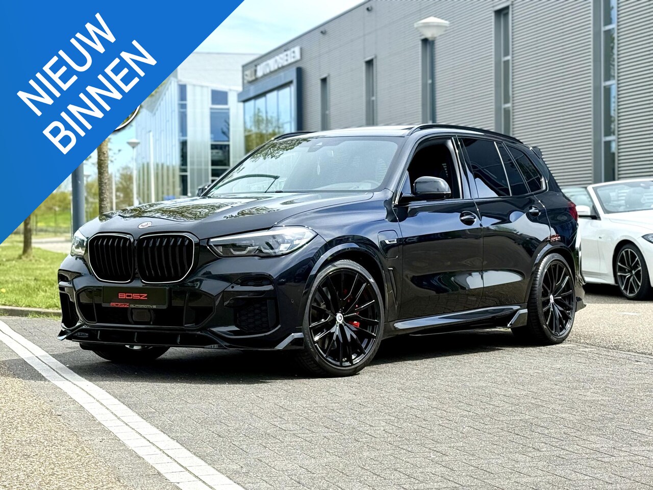 BMW X5 - 45e xDrive M-Sport HUD CRYSTAL SKY PANO - AutoWereld.nl