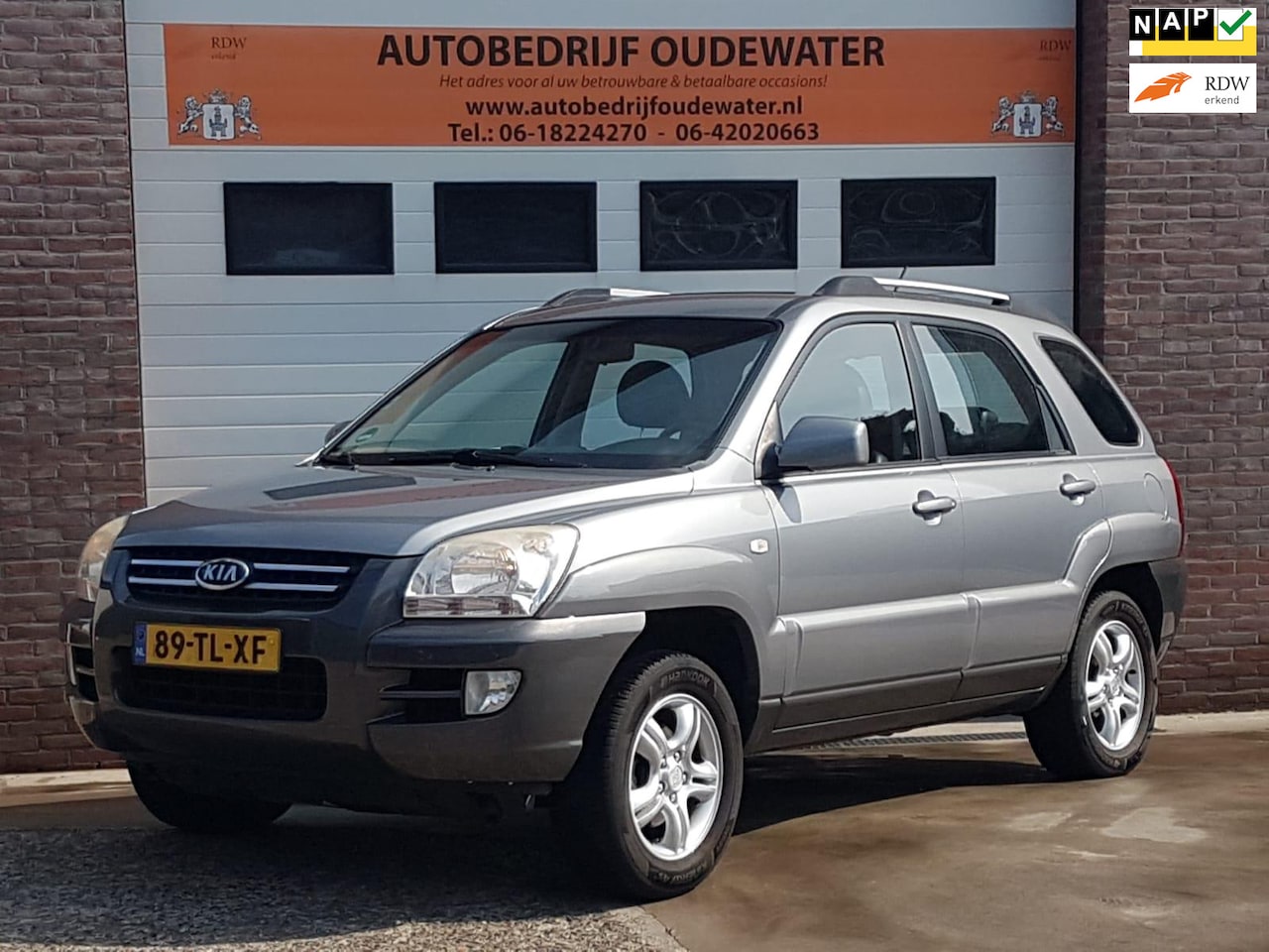 Kia Sportage - 2.0 CVVT Executive 2.0 CVVT Executive - AutoWereld.nl