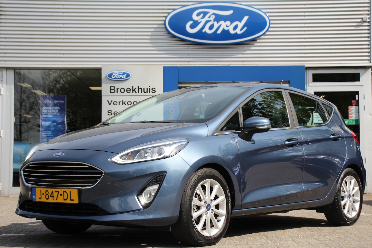 Ford Fiesta - 1.0EB TITANIUM | NL-AUTO! | 1e EIGENAAR! | WINTERPACK: STOEL, STUUR & VOORRUITVERWARMING | - AutoWereld.nl