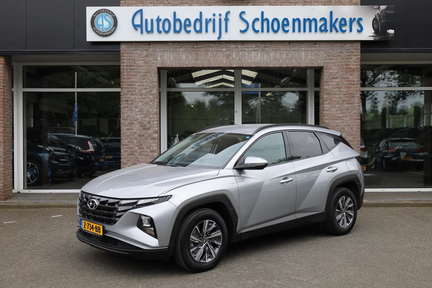 Hyundai Tucson - 1.6 T-GDI MHEV 7DCT CAMERA CARPLAY CRUISE 17"LMV DAB STUUR+STOELVERWARMING PDC 2xKEYLESS - AutoWereld.nl