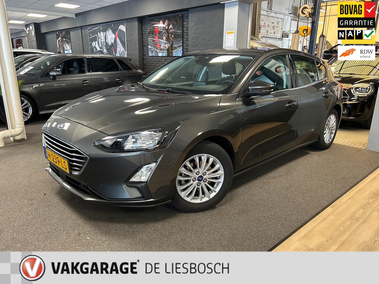 Ford Focus - 1.0 EcoBoost Titanium Business / Airco / lane assist / Navigatie - AutoWereld.nl
