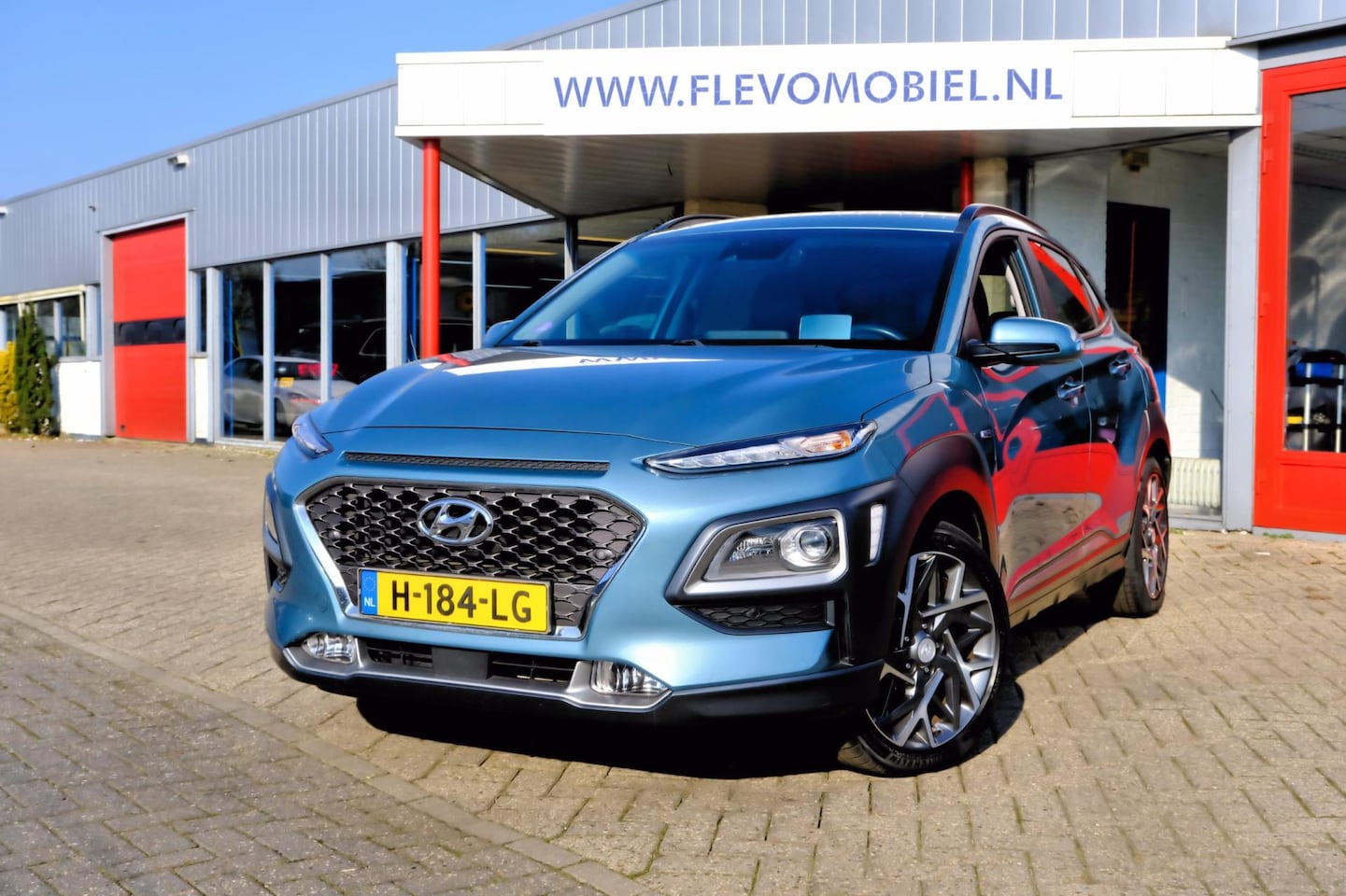 Hyundai Kona - 1.6 GDI HEV Premium Aut. Leder|1e Eig|Navi|HUD|Apple CarPlay|Clima|Enz! - AutoWereld.nl