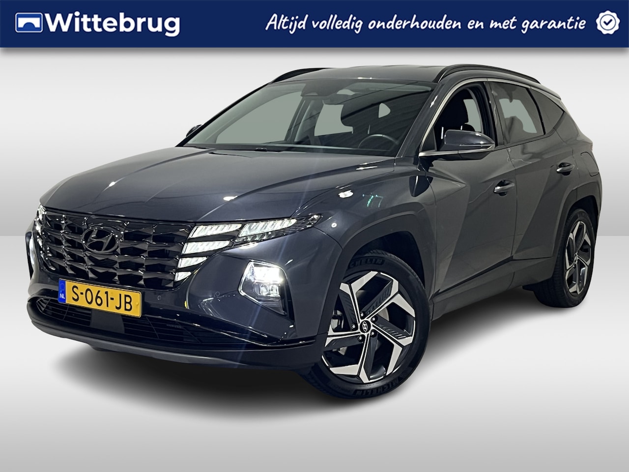 Hyundai Tucson - 1.6 T-GDI PHEV Comfort Smart 4WD | Navigatie | Camera | Verwarmbare voorstoelen | Rijklaar - AutoWereld.nl