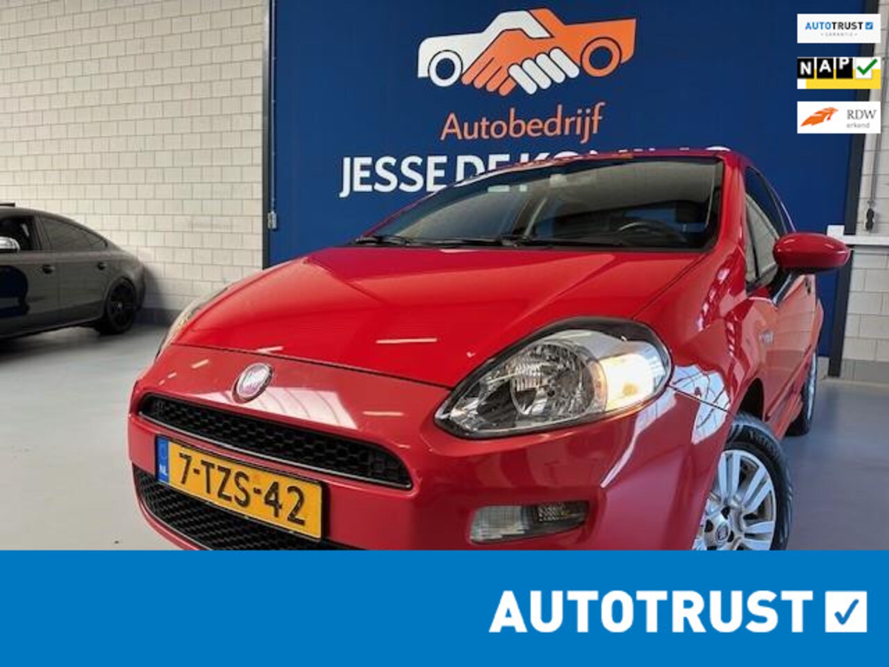 Fiat Punto Evo - 0.9 TwinAir Street 0.9 TwinAir Street,bj.2014,kleur:rood,airco,sportvelgen,NAP met 168711 km.en APK tot 06/20 - AutoWereld.nl