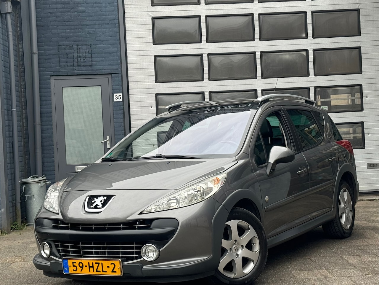 Peugeot 207 SW Outdoor - 1.6 VTi XS | Clima | Camera | Pano - AutoWereld.nl