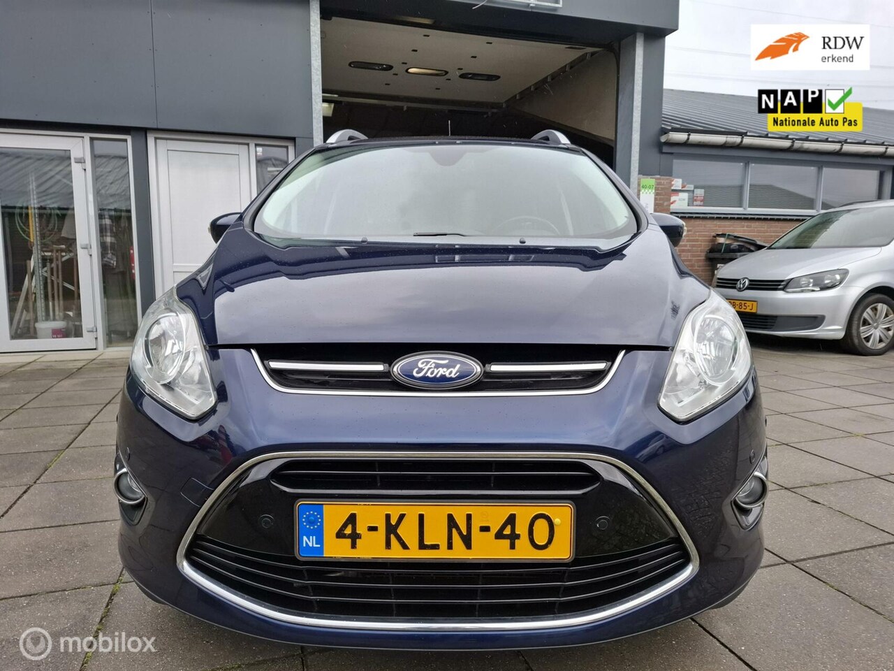 Ford Grand C-Max - 1.0 Lease Titanium/clima/navi/trekhaak - AutoWereld.nl