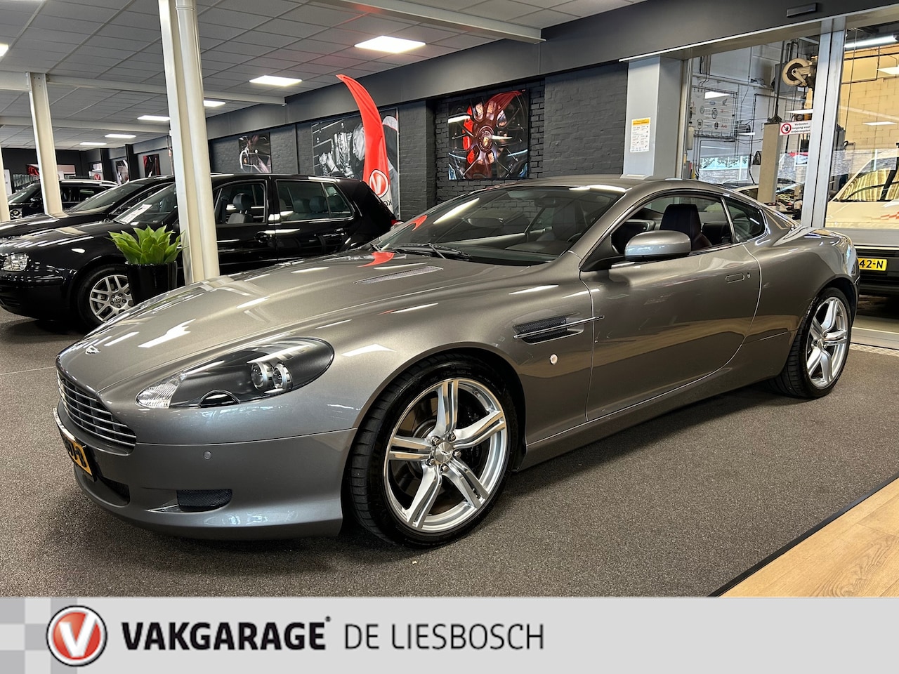 Aston Martin DB9 - 5.9 V12 Touchtronic | Leder| Navigatie | perfecte staat | onderhoud historie aanwezig | - AutoWereld.nl