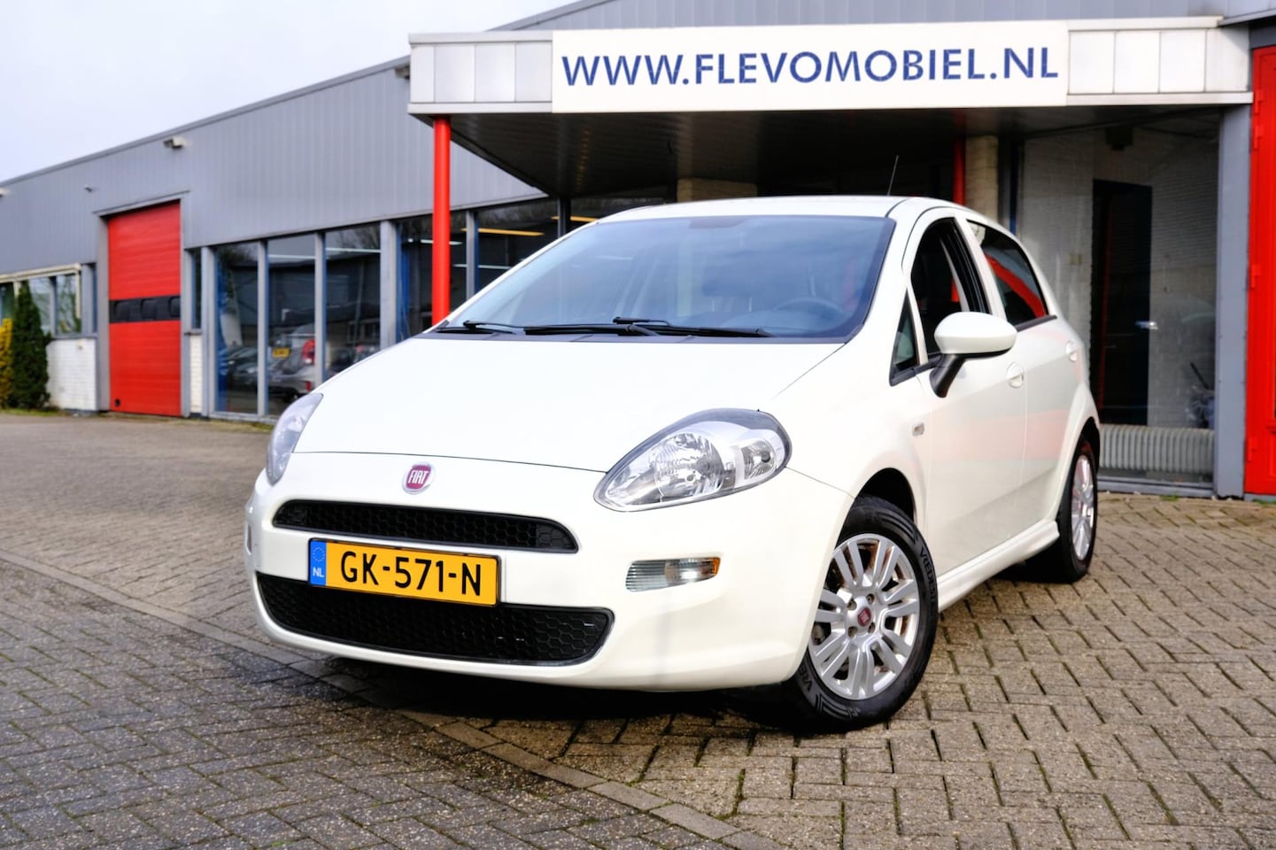 Fiat Punto Evo - 1.3 M-Jet Lounge 5-drs Airco|LMV - AutoWereld.nl