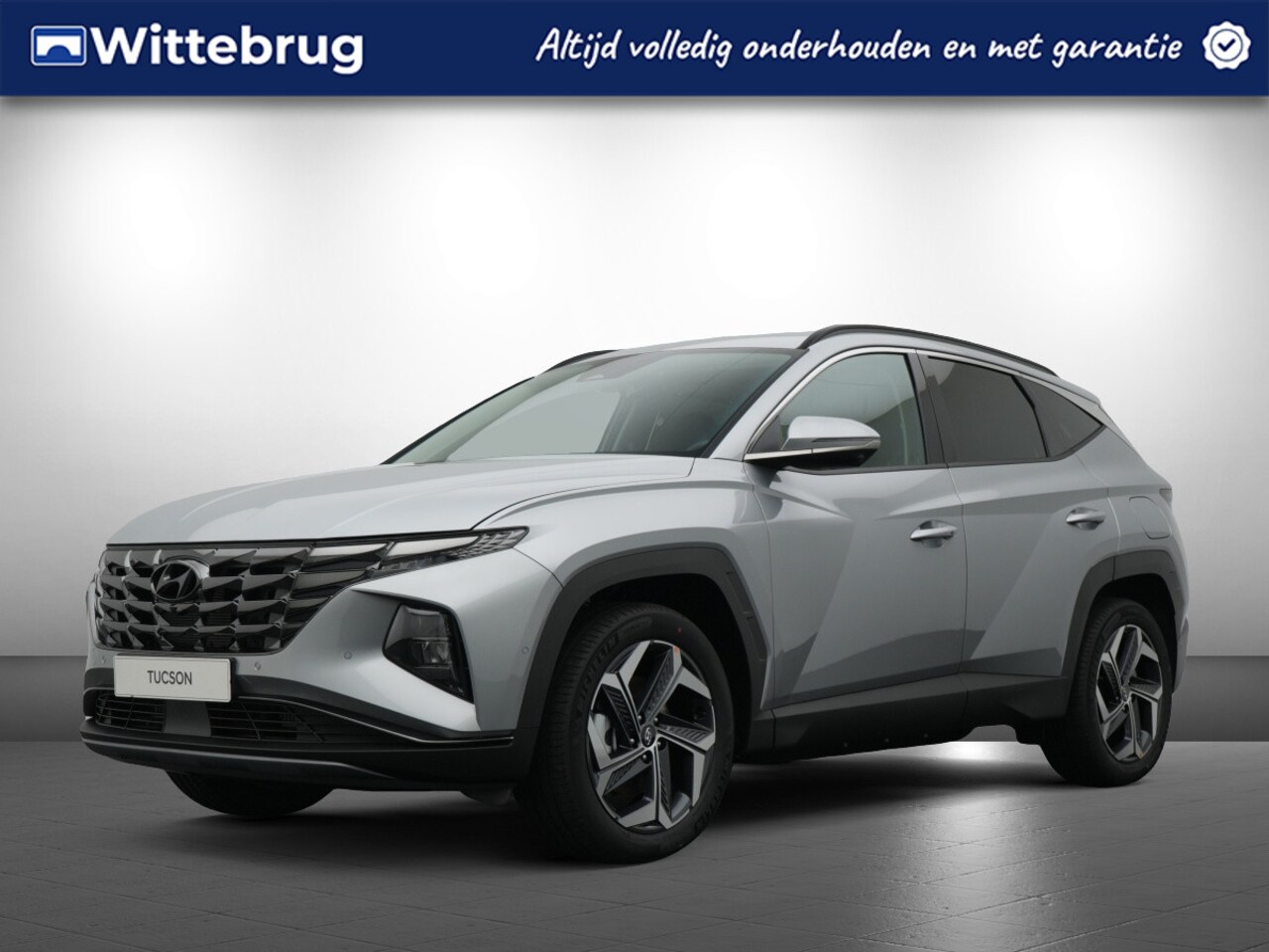 Hyundai Tucson - 1.6 T-GDI PHEV Premium 4WD Plug-In Hybride met Navigatie, Lederen bekleding en Stoelverwar - AutoWereld.nl
