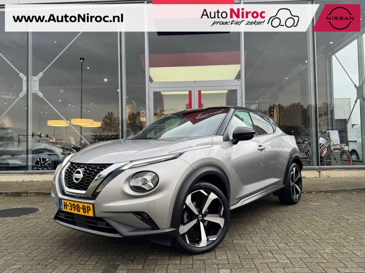 Nissan Juke - 1.0 DIG-T Premiere Edition | NAVIGATIE | TREKHAAK | STOELVERWARING | - AutoWereld.nl