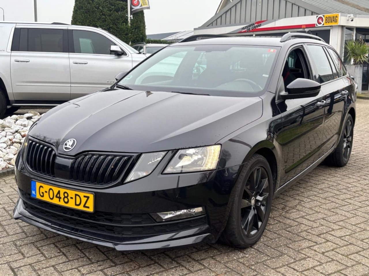 Skoda Octavia Combi - 1.5 TSI Sport 2019 Zwart Black Edition BTW - AutoWereld.nl