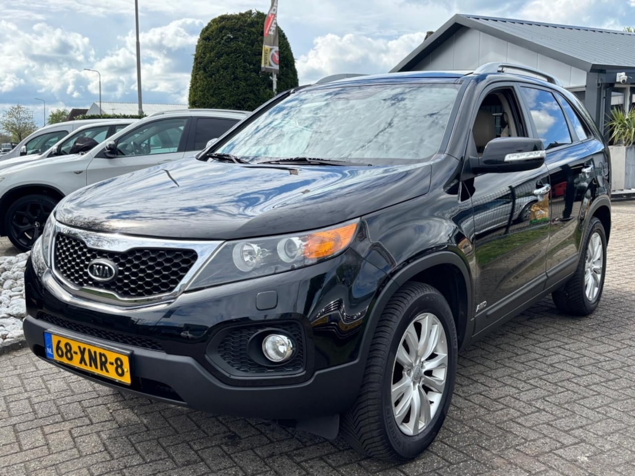 Kia Sorento - 2.4 X-clusive Automaat 4WD Zwart 2012 Trekhaak - AutoWereld.nl