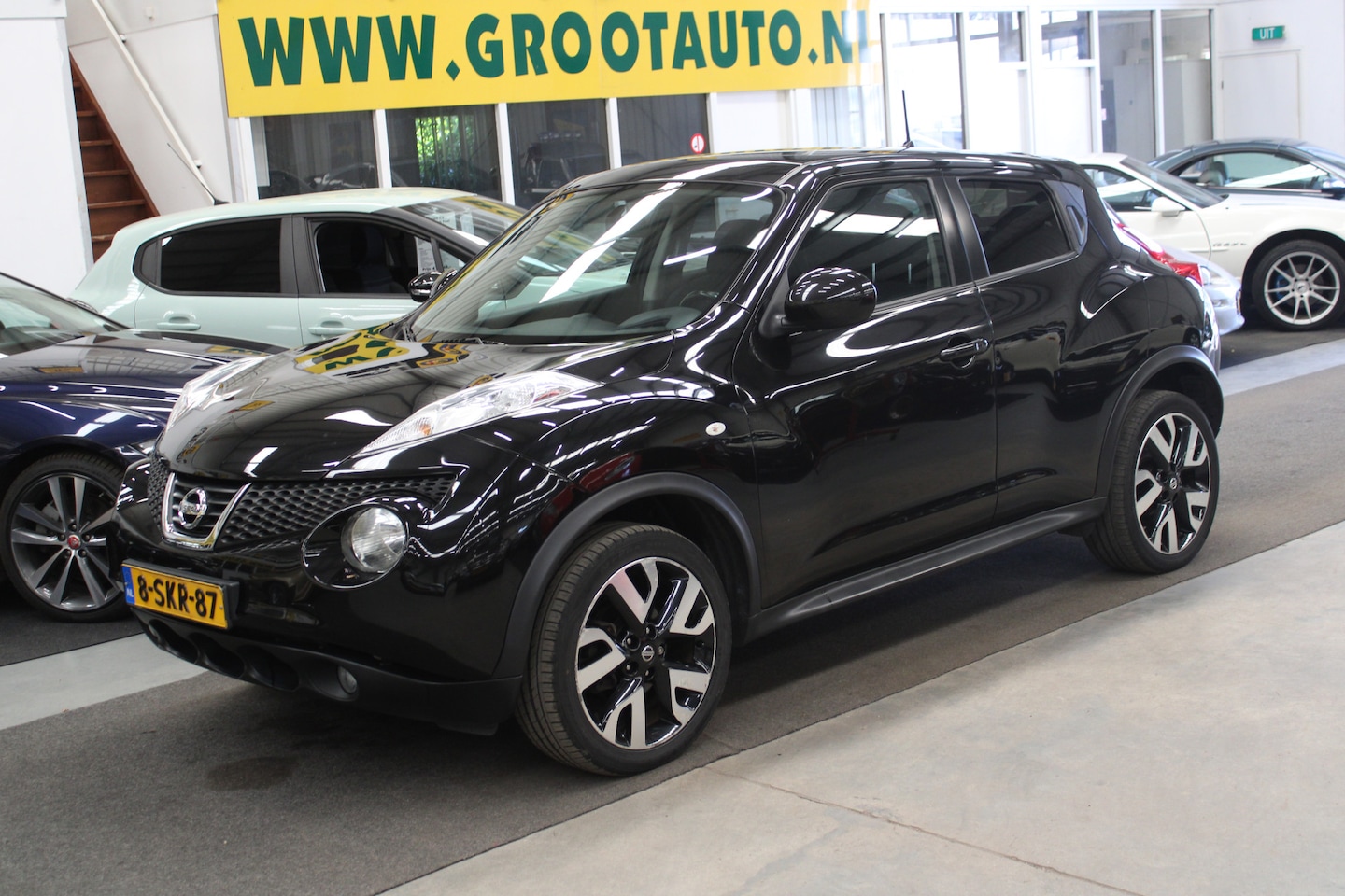 Nissan Juke - 1.6 Acenta 88.707km NAP, Airco, Cruise control, Stuurbekrachtiging - AutoWereld.nl
