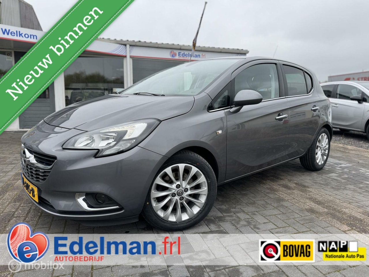 Opel Corsa - 1.4-16V Cosmo 5DRS | PDC | 4x NWE BAND | CRUISE - AutoWereld.nl