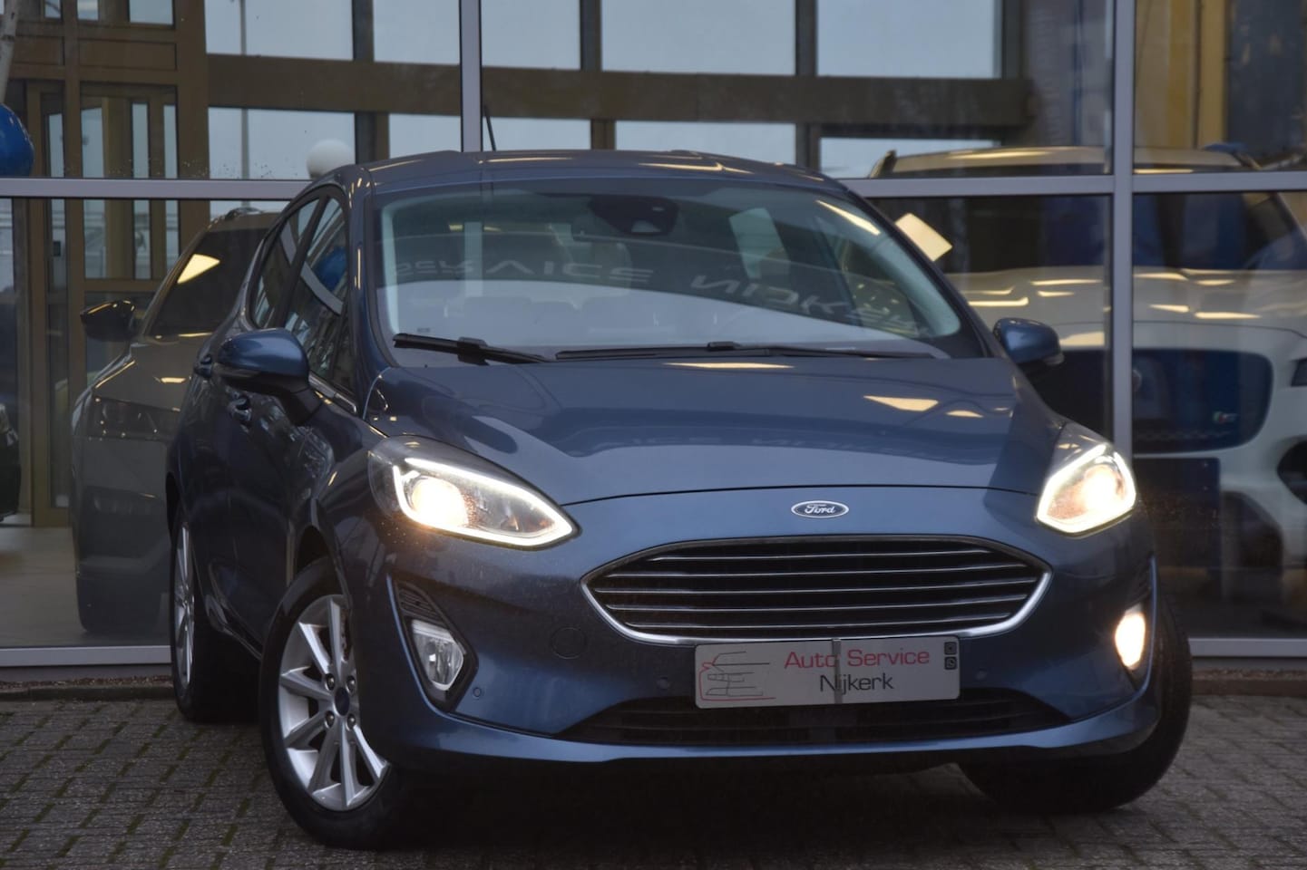 Ford Fiesta - 1.0 EcoBoost Titanium Airco Nav. Stoelverwarming 1ste Eigenaar - AutoWereld.nl