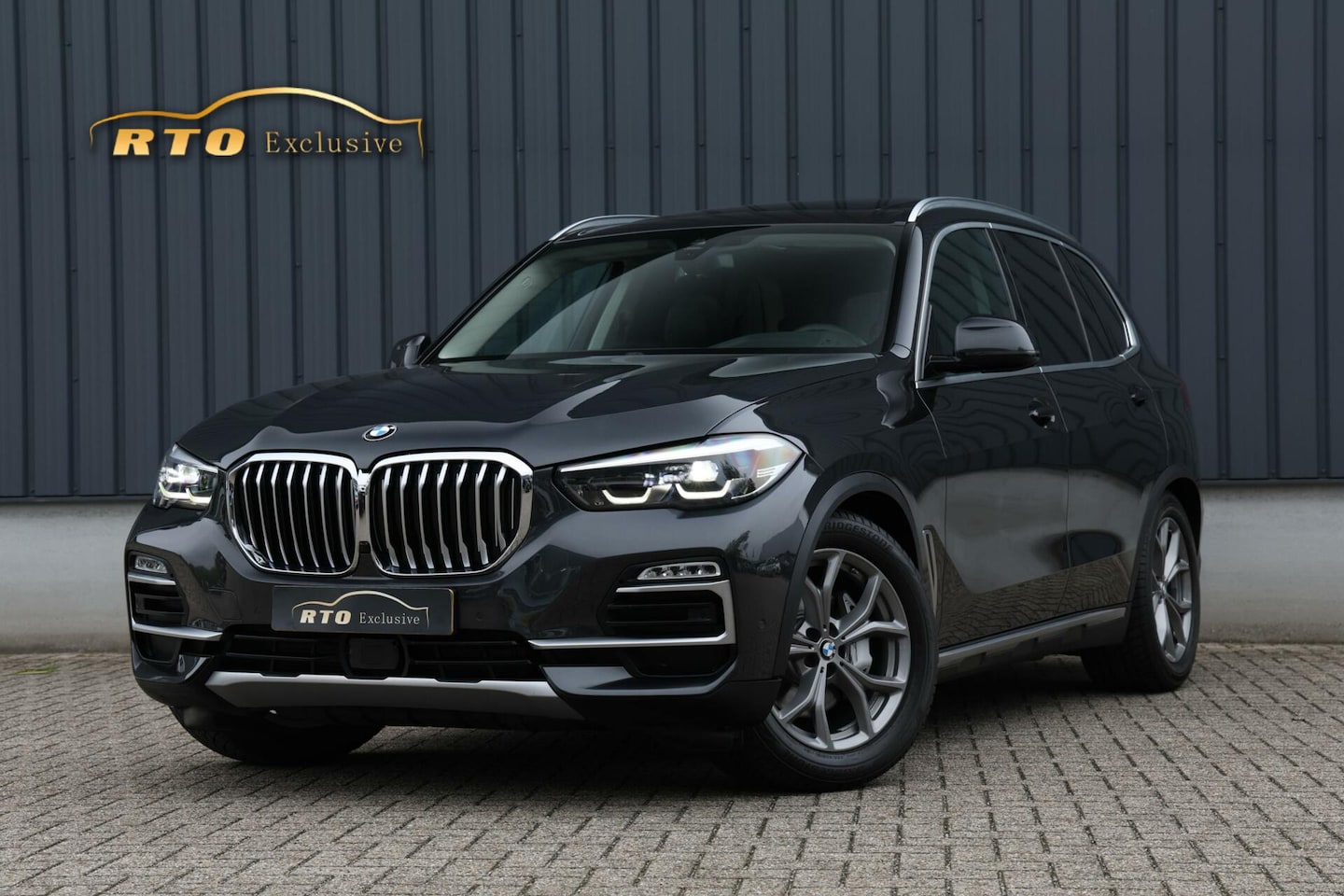 BMW X5 - xDrive40i High Executive|Achterasbesturing|ACC|Pano - AutoWereld.nl