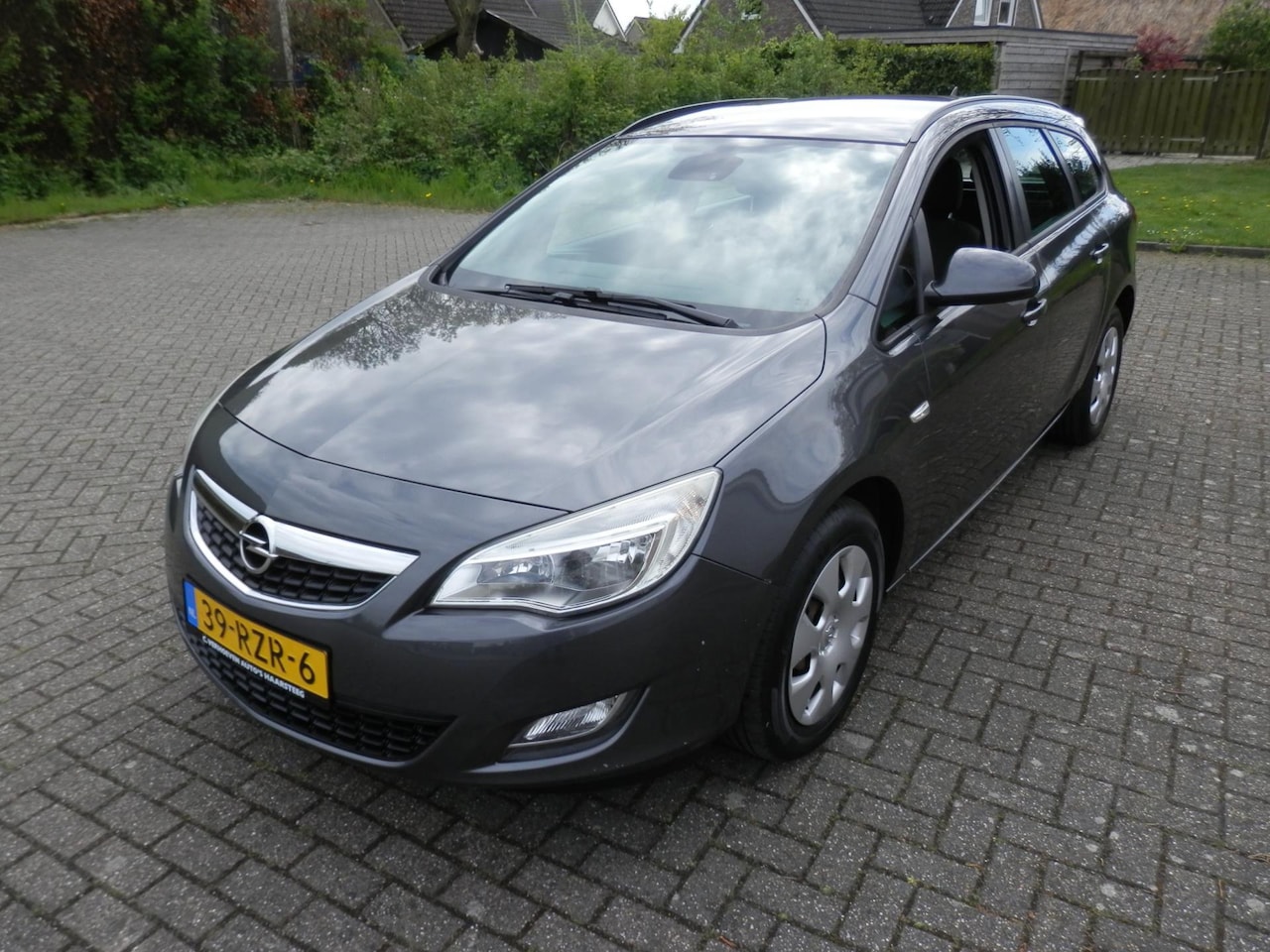 Opel Astra Sports Tourer - 1.4 Editionairco navi geen riem maar ketting - AutoWereld.nl