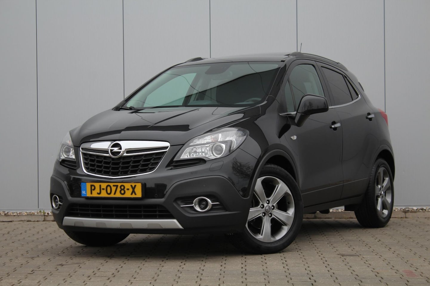 Opel Mokka - 1.6 Cosmo | Panoramadak | Trekhaak | Stuur/Stoelverwarming | Clima / Cruise control | PDC - AutoWereld.nl