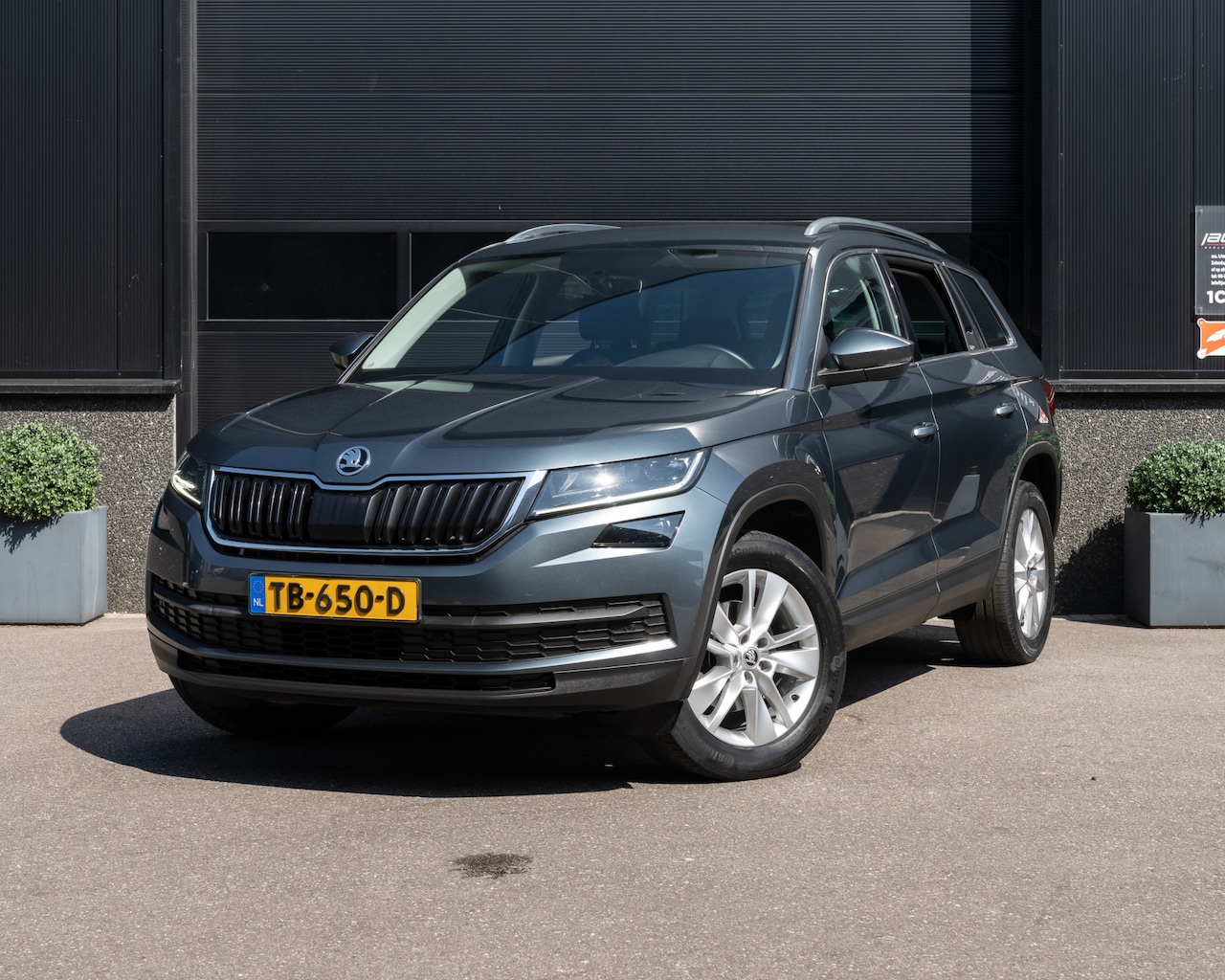 Skoda Kodiaq - 1.4 TSI Ambition Business | Keyless | Camera | Sfeer | Airco | Cruise Control | Navi | App - AutoWereld.nl