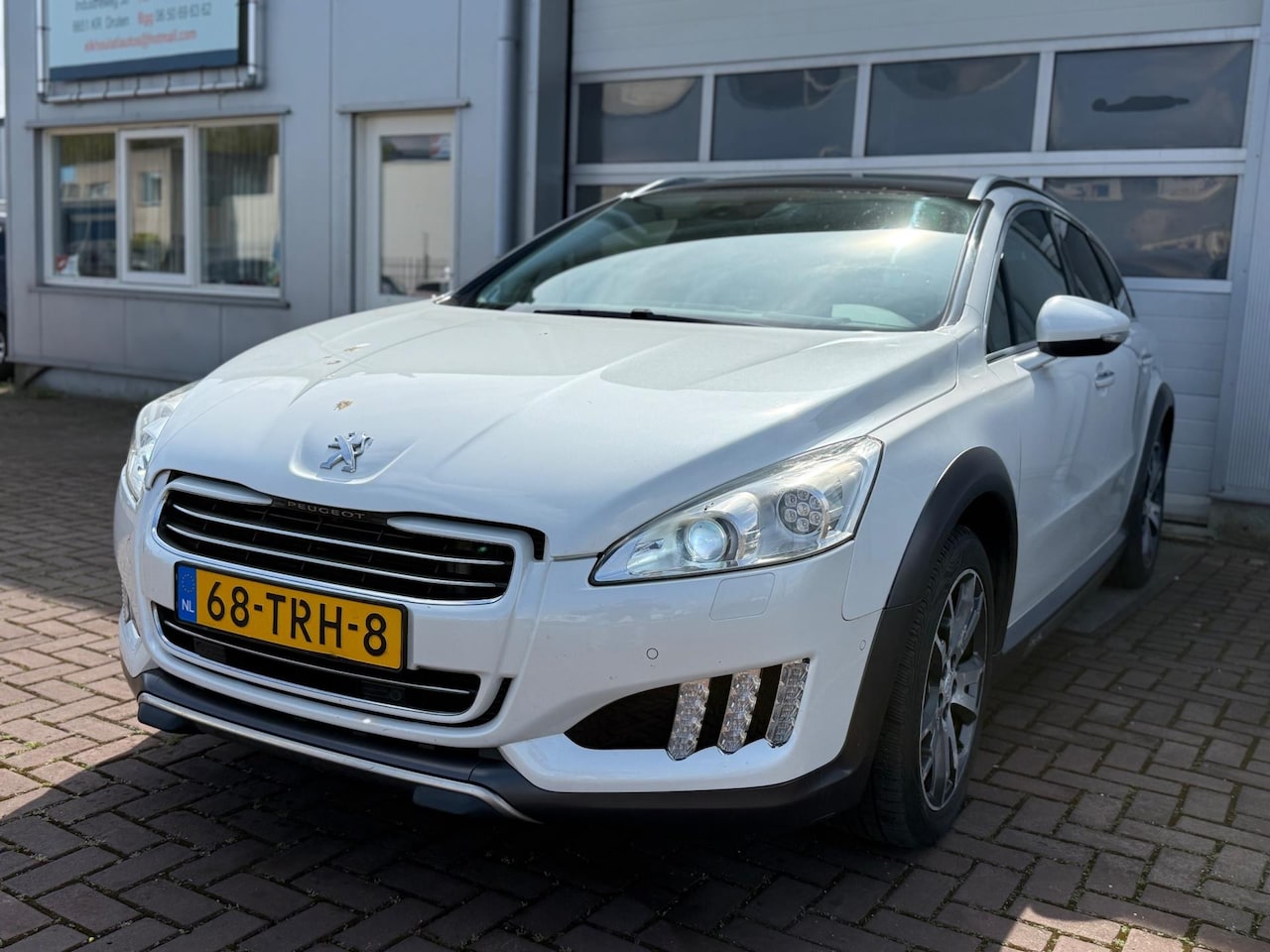 Peugeot 508 RXH - 2.0 HDi HYbrid4 2.0 HDi Hybrid4 - AutoWereld.nl