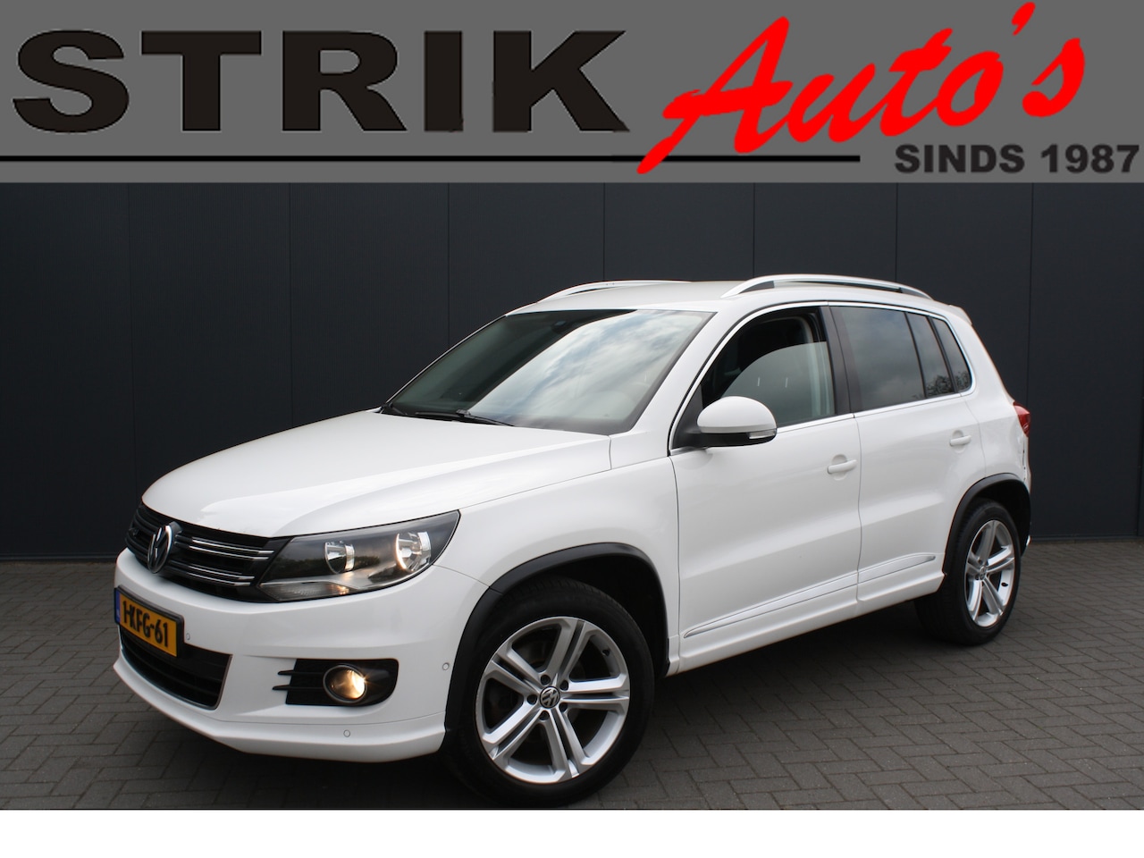Volkswagen Tiguan - 1.4 TSI Sport&Style 4Motion R-LINE - NAVIGATIE - TREKHAAK - PDC - AutoWereld.nl