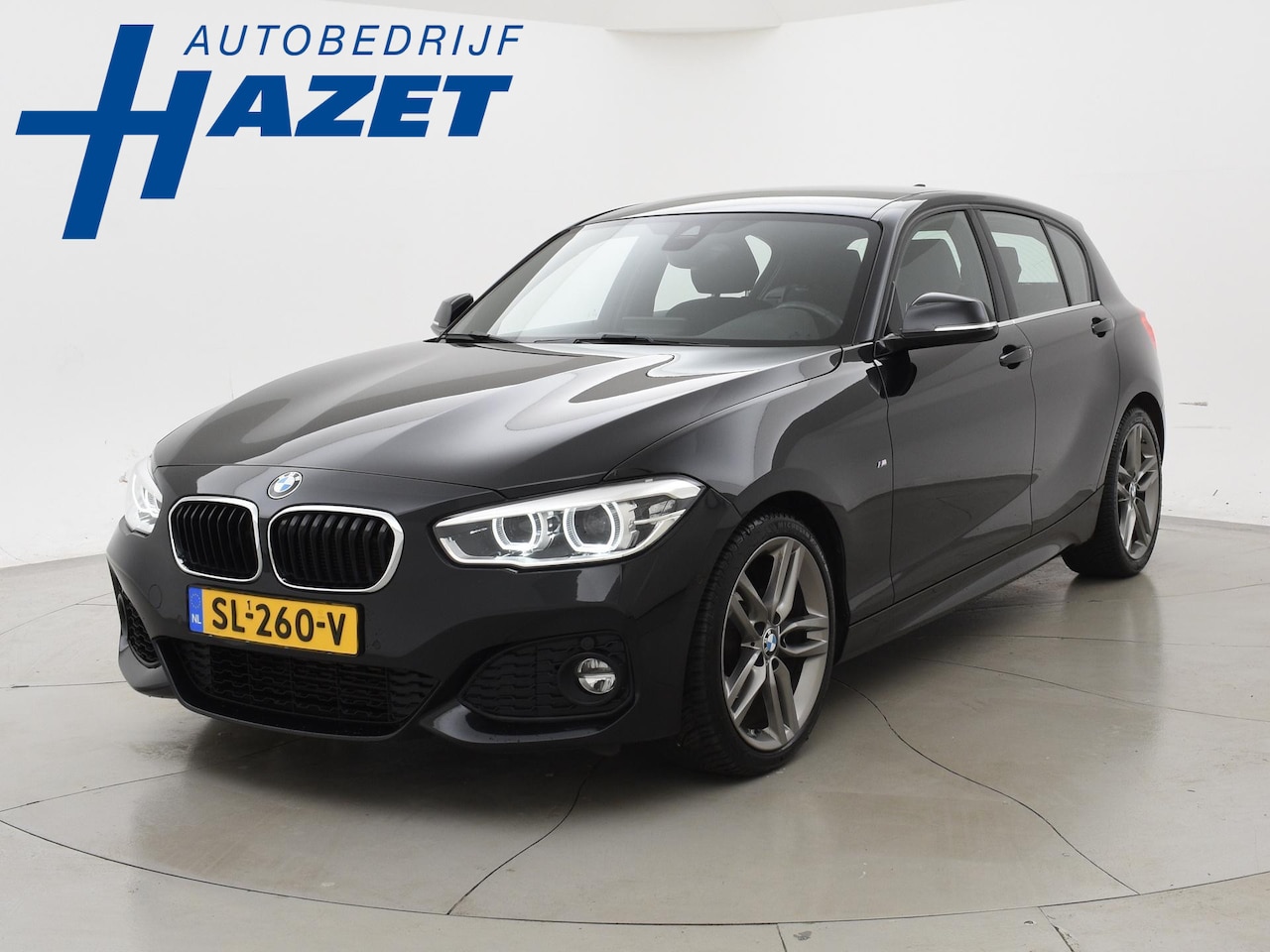 BMW 1-serie - 118i AUT8 5-DEURS M-SPORT INTERIEUR + EXTERIEUR | NAVI PROFESSIONAL | CAMERA | STOELVERW. - AutoWereld.nl