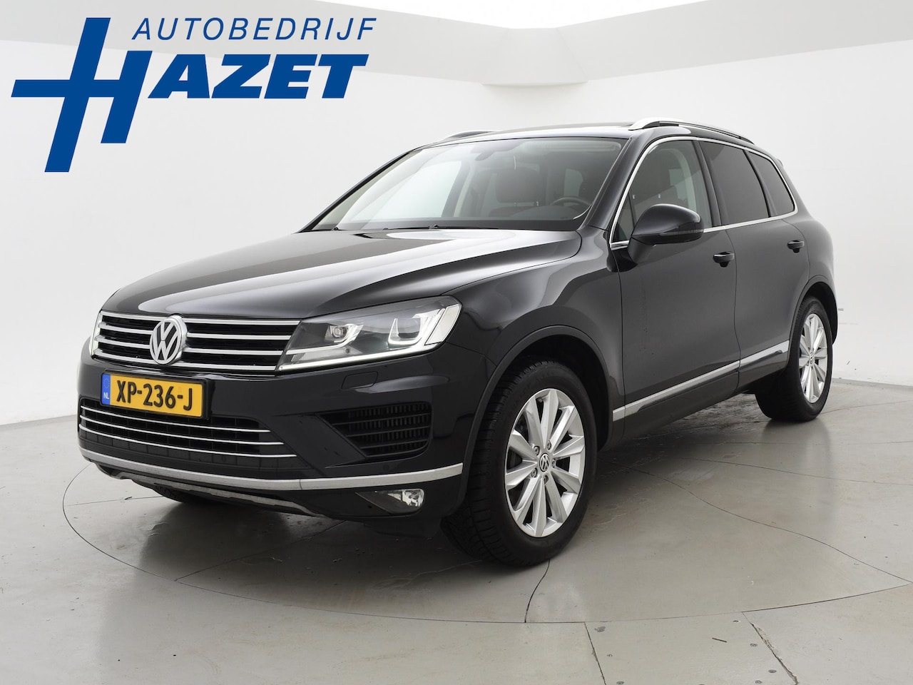 Volkswagen Touareg - 3.0 TDI V6 262 PK HIGHLINE + LUCHTVERING | WEGKL. TREKHAAK | PANORAMA | LEDER - AutoWereld.nl
