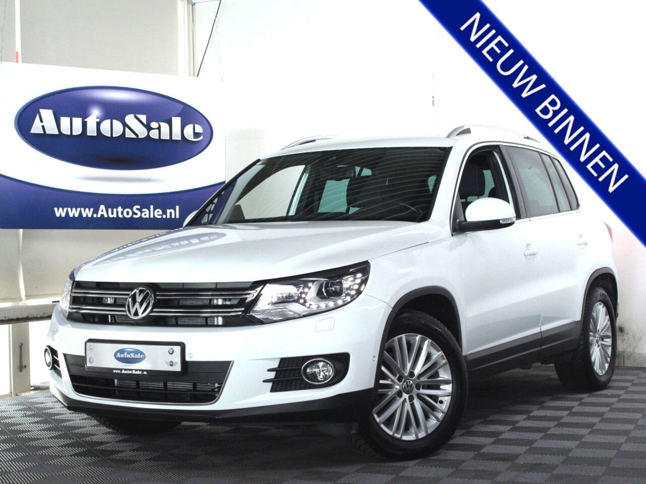Volkswagen Tiguan - 1.4 TSI DSG Sport&Style NAV CAMRA XENON KEYLS STOELVW '14 - AutoWereld.nl