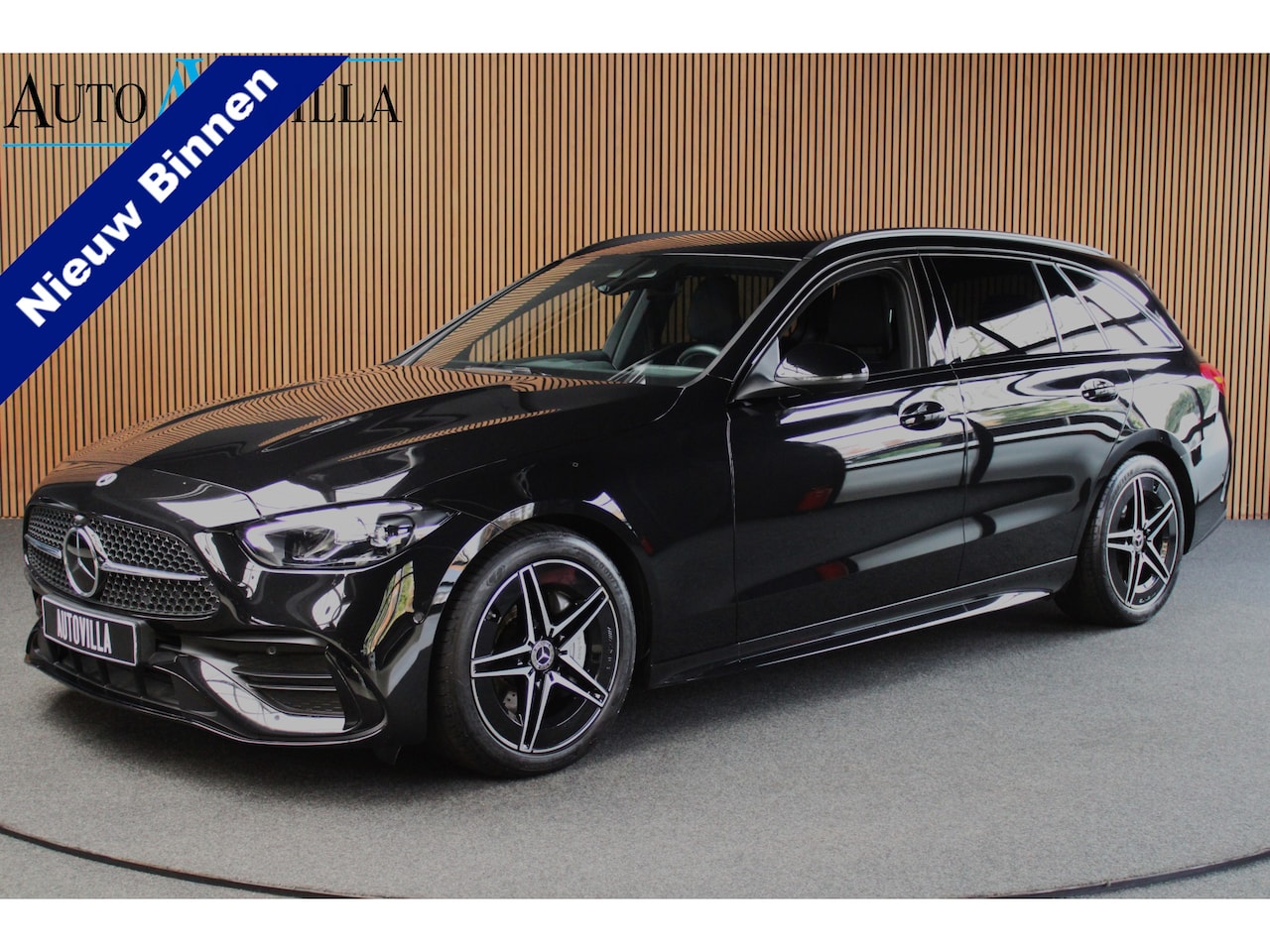 Mercedes-Benz C-klasse Estate - 180 AMG Line Navi Leer Camera Nightpack PTS Ambient Elekt. achterklep Trekhaak elektr. PTS - AutoWereld.nl