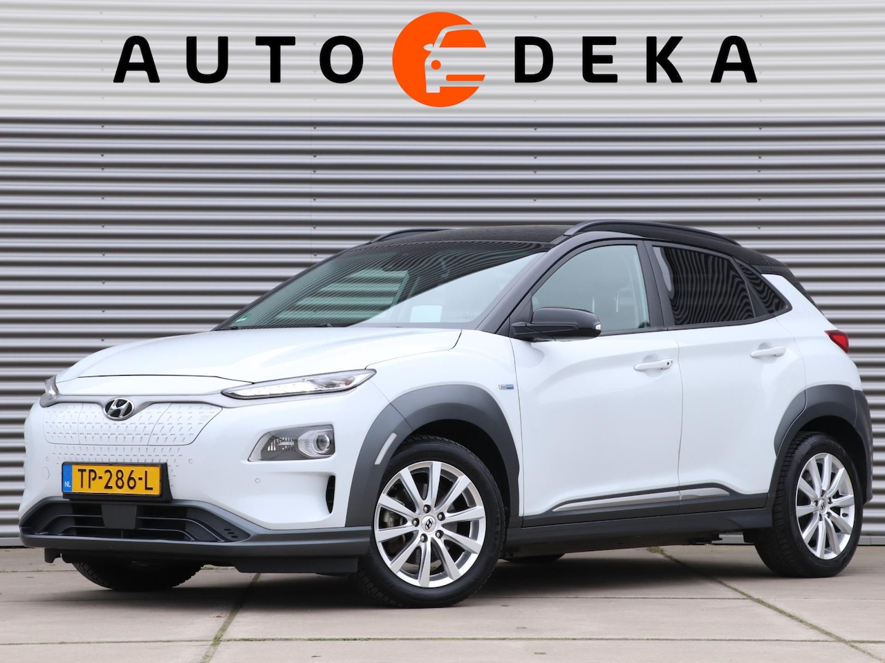 Hyundai Kona Electric - EV Premium 64 kWh *Leder*Stoelverw.+ventilatie*Parkeersens.* - AutoWereld.nl