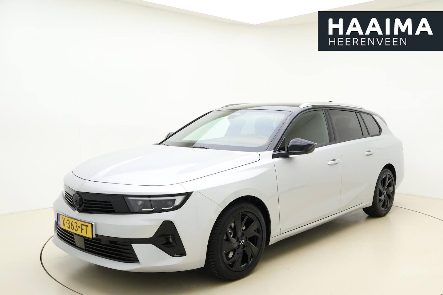 Opel Astra Sports Tourer - 1.2 Turbo 130pk Automaat Level 4 | Navigatie | Climate control | Camera | Keyless | Zwart - AutoWereld.nl