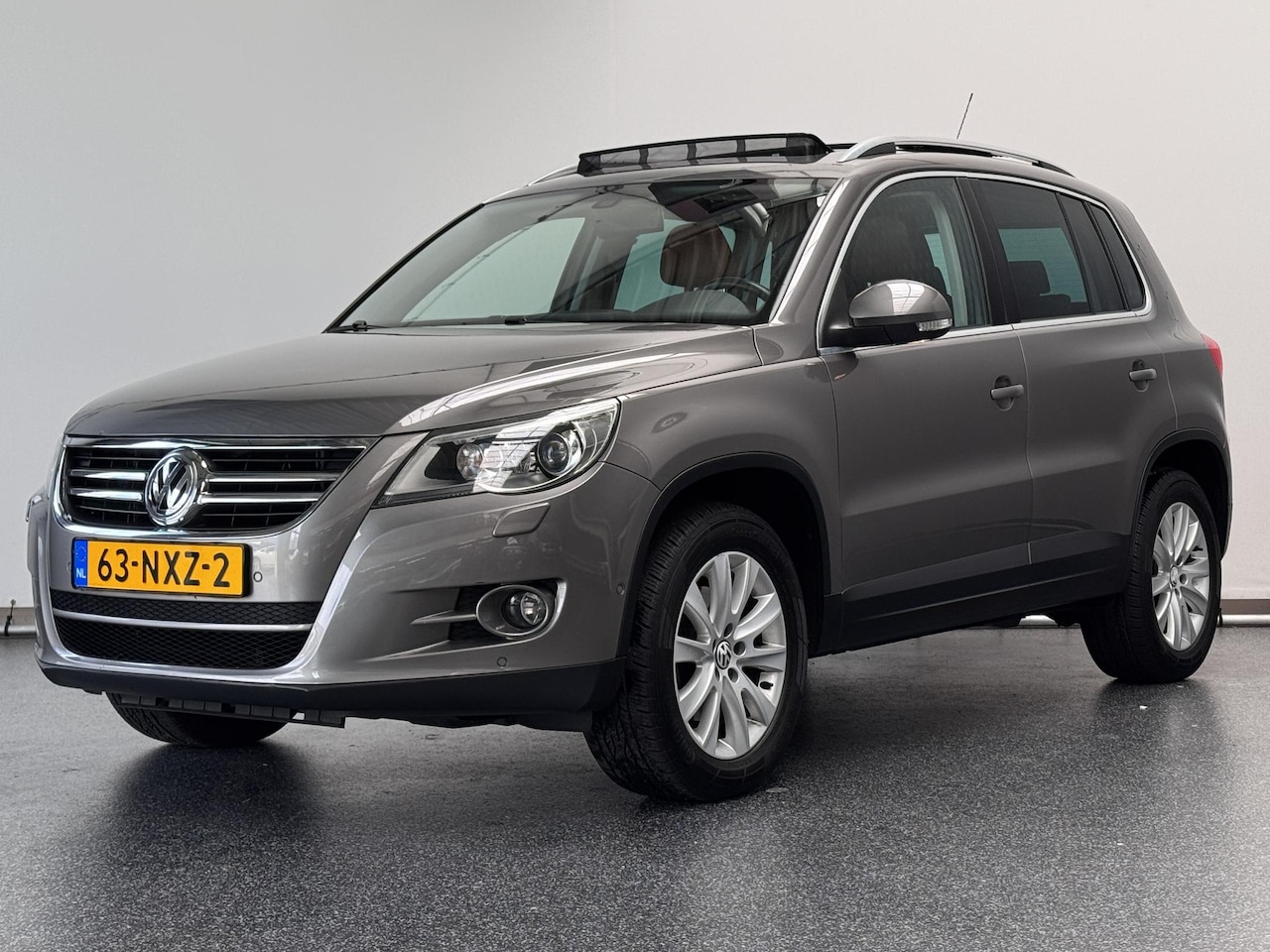 Volkswagen Tiguan - 2.0 TSI Sport&Style 4Motion | Automaat | Schuifdak | Leer - AutoWereld.nl