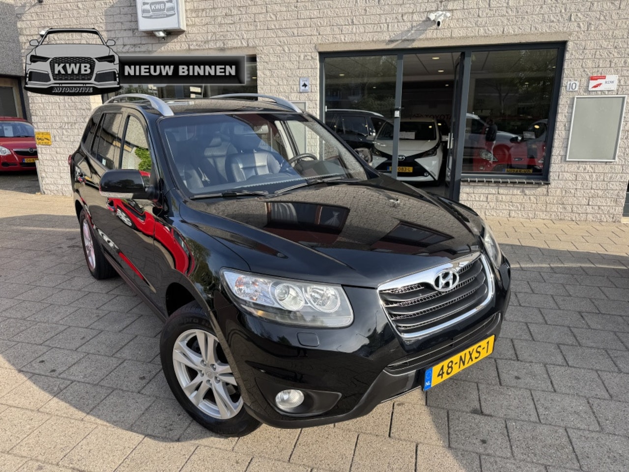Hyundai Santa Fe - 2.4i Style airco apk clima leer trekhaak - AutoWereld.nl