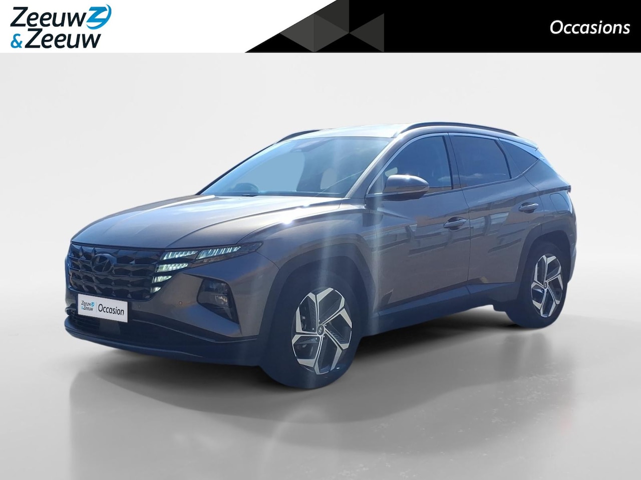 Hyundai Tucson - 1.6 T-GDI PHEV Comfort 4WD | PDC | Camera | Stoelverwarming | LMV | Navigatie | - AutoWereld.nl