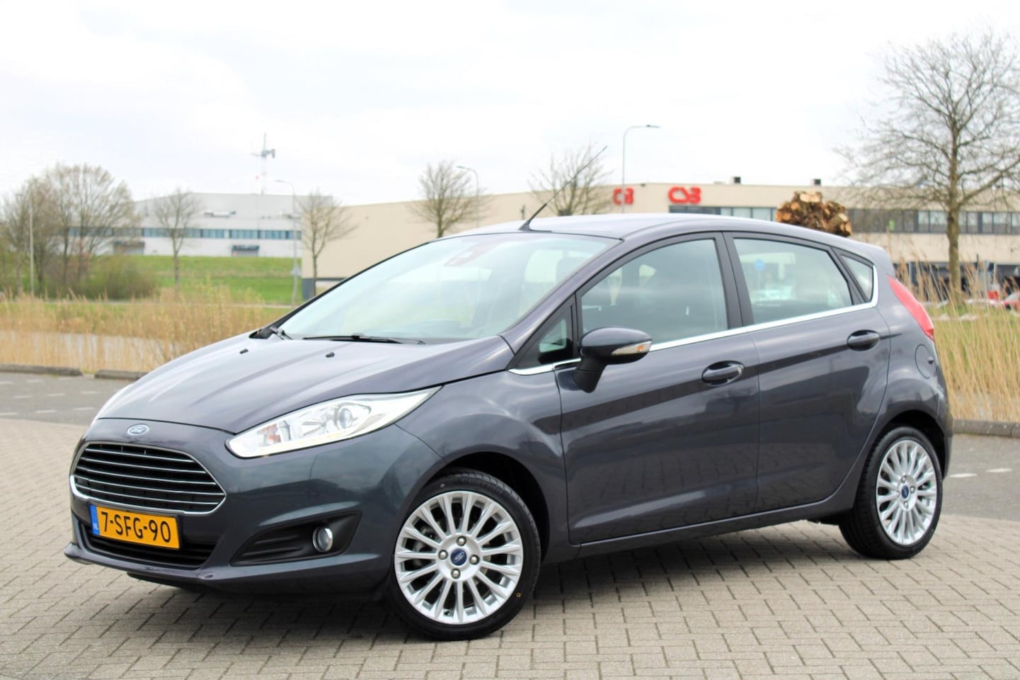 Ford Fiesta - 1.0 EcoBoost Titanium l Clima l Cruise l PDC - AutoWereld.nl