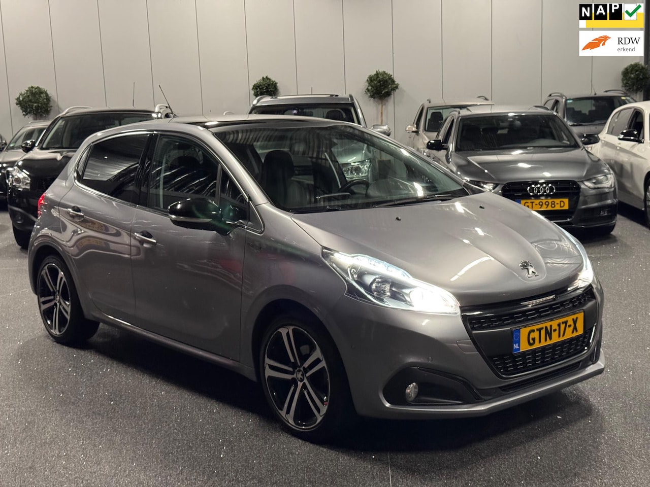Peugeot 208 - 1.2 PureTech GT-Line Navi | Pano | LED | Cruise | Trekhaak - AutoWereld.nl