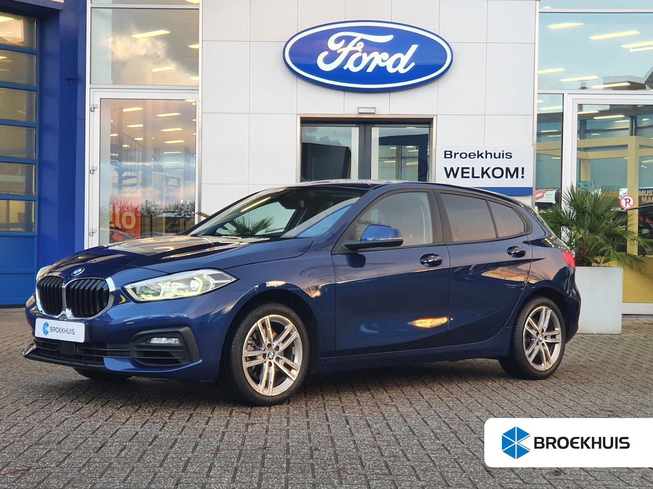 BMW 1-serie - 118i High Executive Edition | Cruise Control | Stoelverwarming | Navigatie | Cruise Contro - AutoWereld.nl