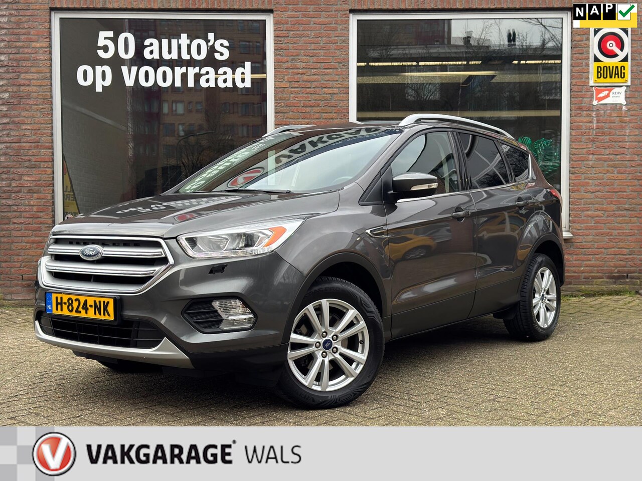 Ford Kuga - 1.5 ECOBOOST TITANIUM | NAVI | STOEL-STUUR VERWARMING | VELGEN | CRUISE | TREKHAAK | CARPL - AutoWereld.nl