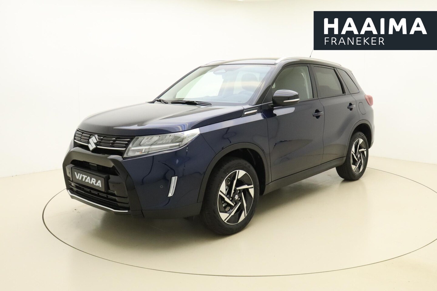 Suzuki Vitara - 1.4 Boosterjet Style Smart Hybrid | Achteruitrijcamera | Cruise control | Navigatie | Park - AutoWereld.nl