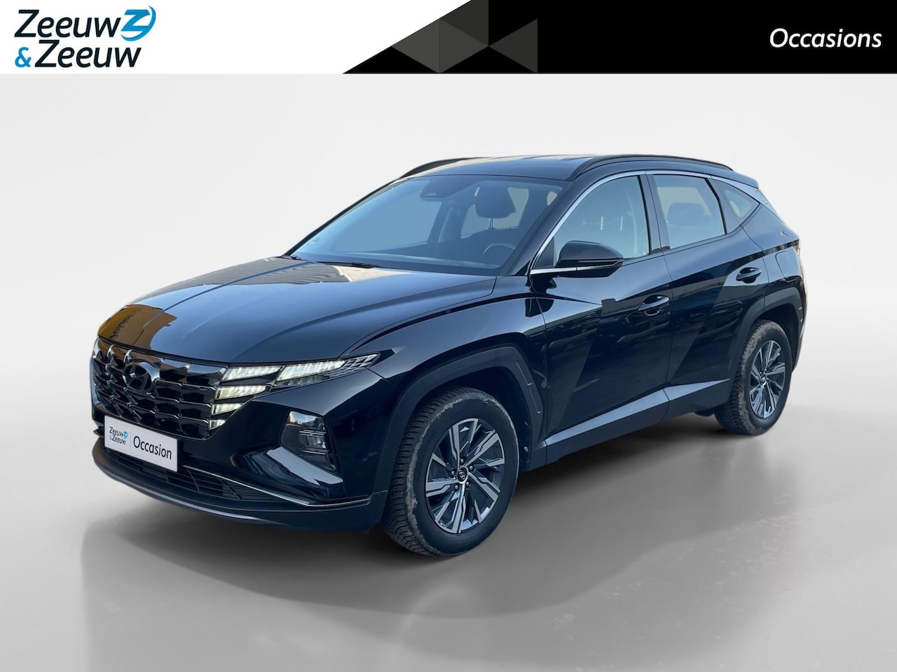 Hyundai Tucson - 1.6 T-GDI HEV Comfort 4WD 180pk automaat | All season banden | Navigatie | Trekhaak | Acht - AutoWereld.nl