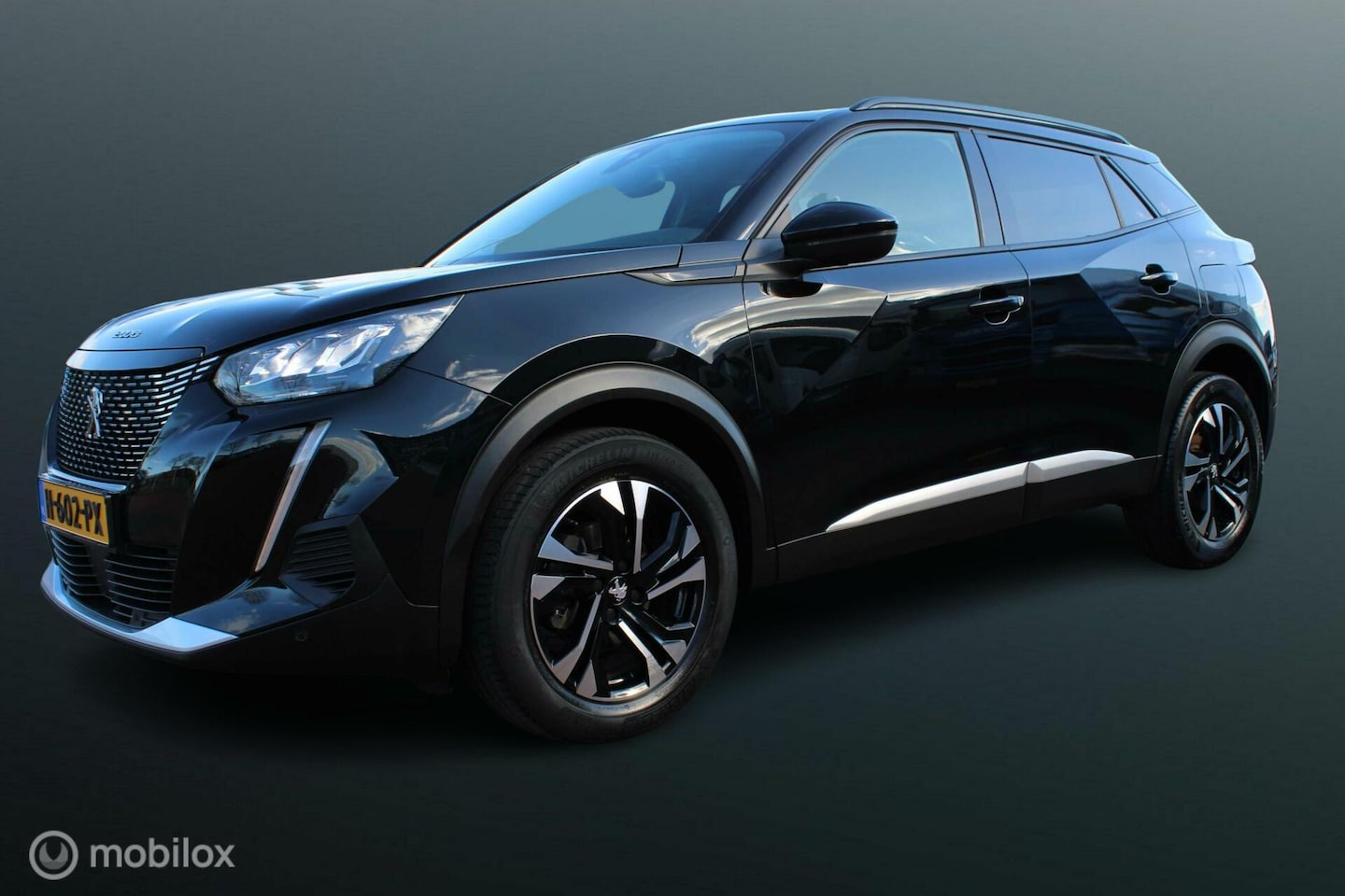 Peugeot 2008 - 1.2 PureTech Allure 1.2 PureTech Allure, Digitaal dashboard, Pdc voor/achter + camera, App connect, Donker gla - AutoWereld.nl