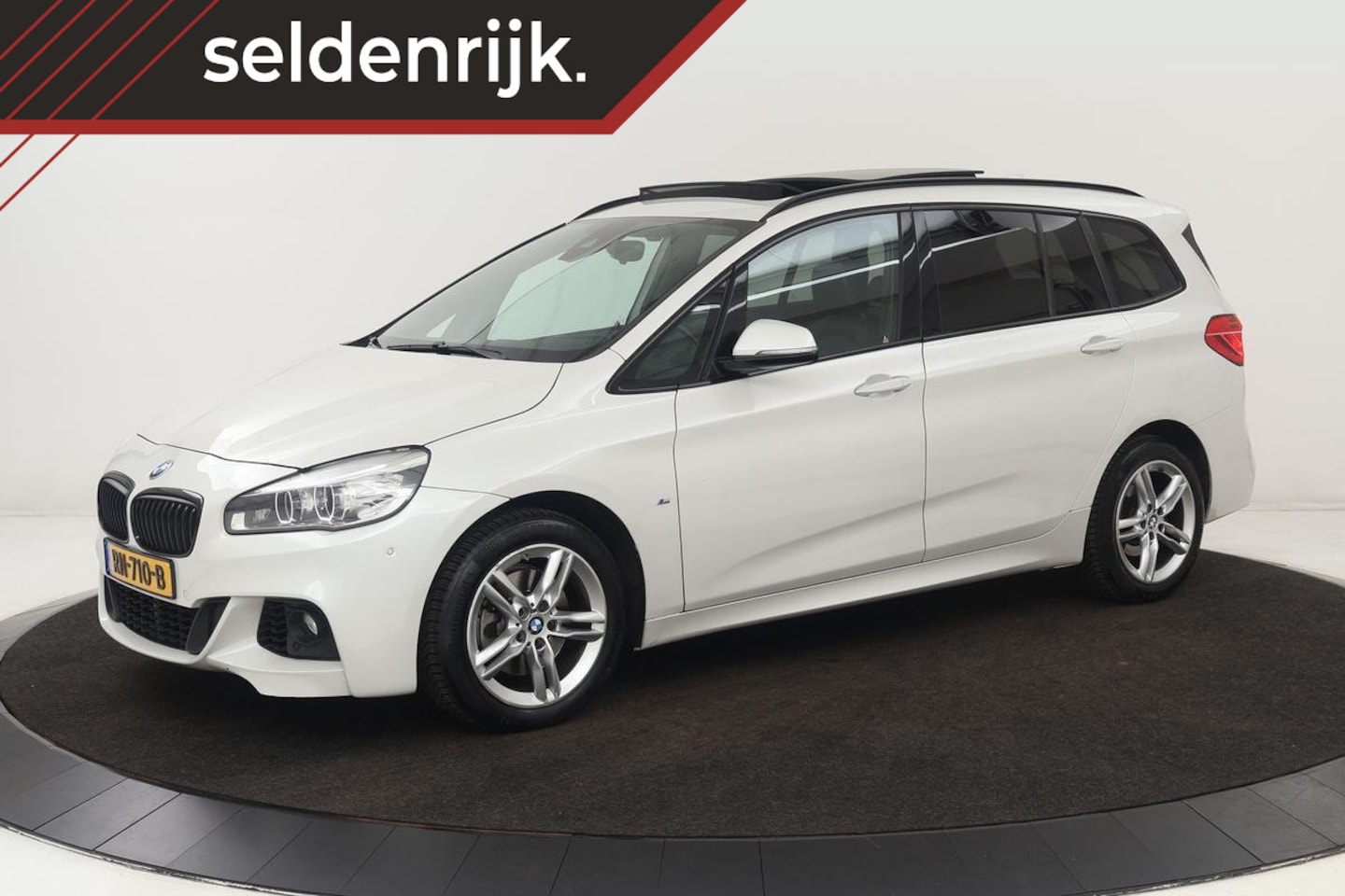 BMW 2-serie Gran Tourer - 218i M Sport 7-persoons | Panoramadak | Leder | Stoelverwarming | Trekhaak | Camera | Full - AutoWereld.nl