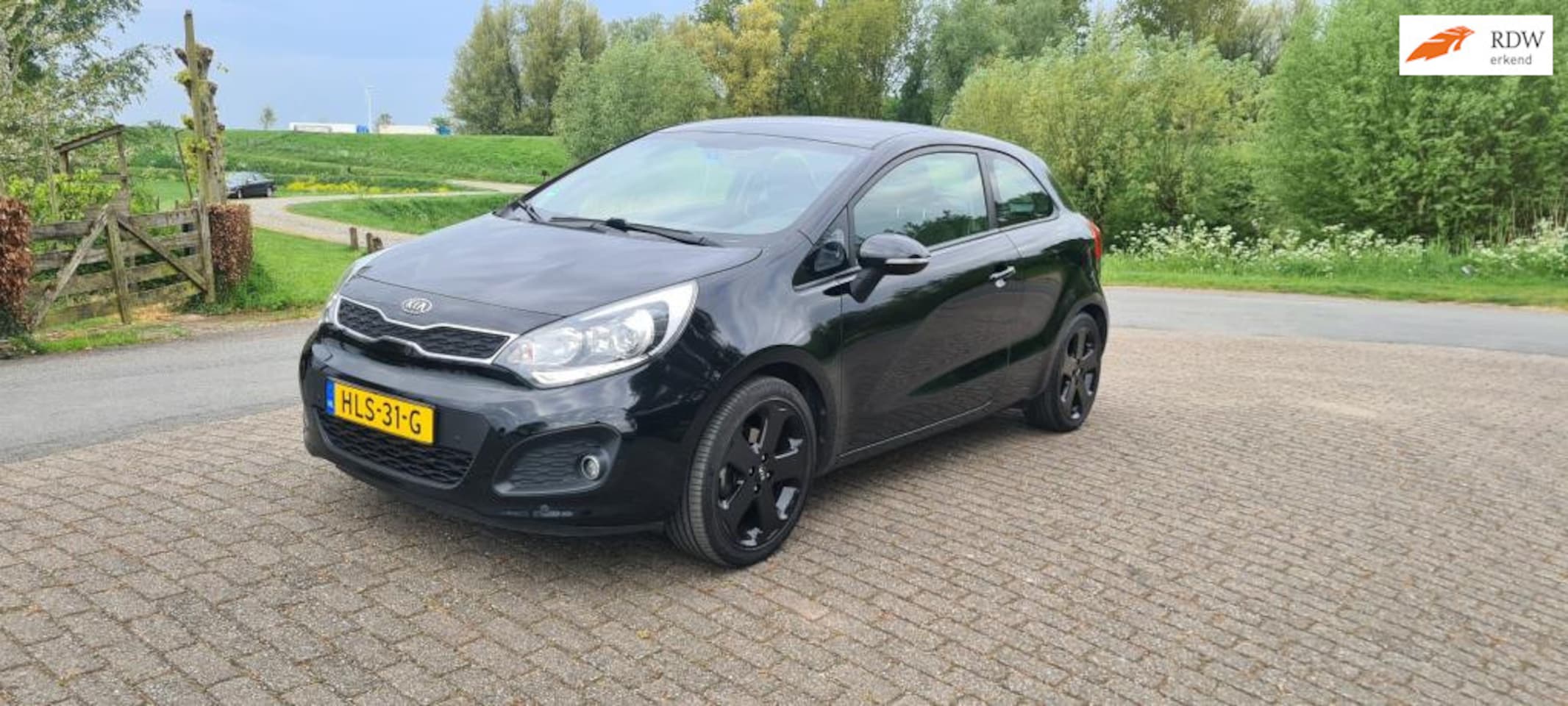 Kia Rio - 1.2 CVVT Comfort Pack 1.2 CVVT Comfort Pack - AutoWereld.nl
