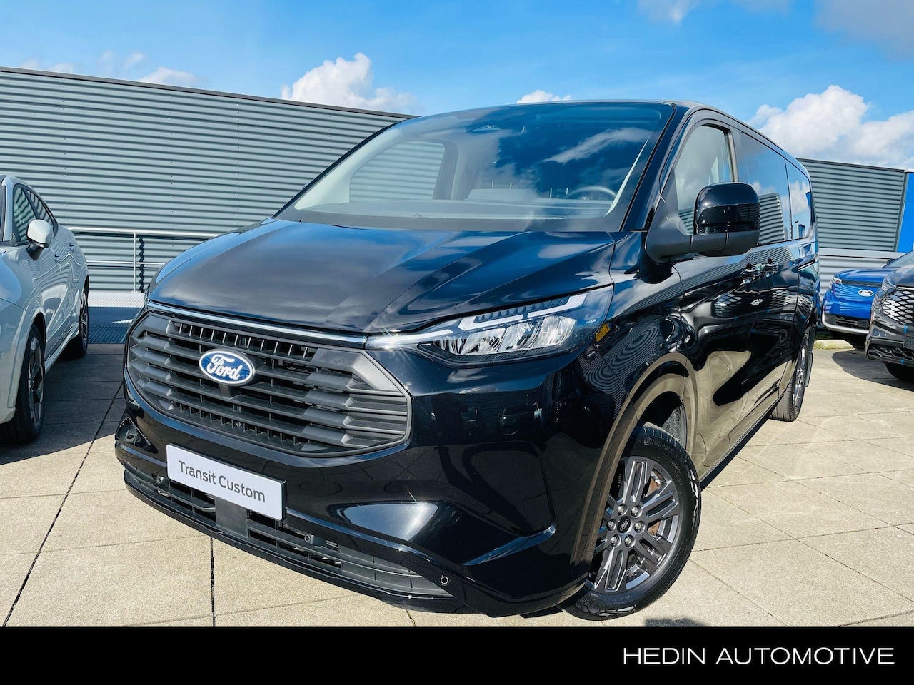 Ford Transit Custom - 340 2.5 PHEV L2H1 Limited Kombi te bestellen - AutoWereld.nl