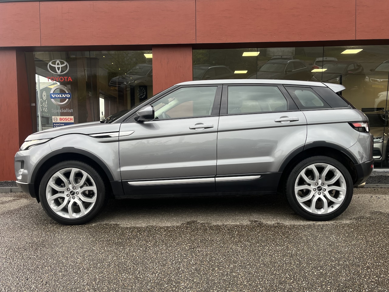 Land Rover Range Rover Evoque - 2.0 Si 4WD Prestige | Leer | Pano | Camera | Stoelverw. | Meridian - AutoWereld.nl
