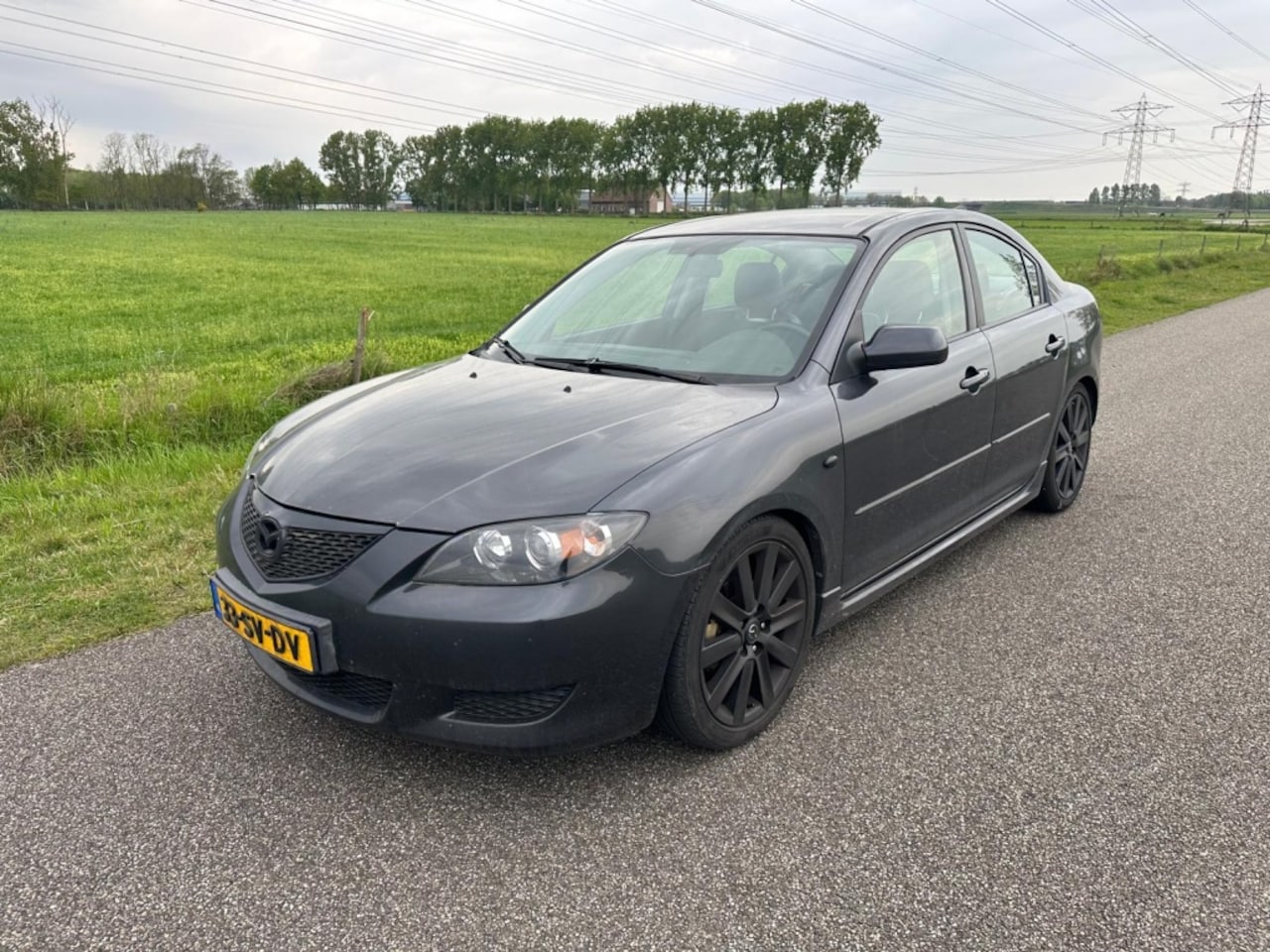 Mazda 3 Sport - 1.6 Touring Sportl. - AutoWereld.nl