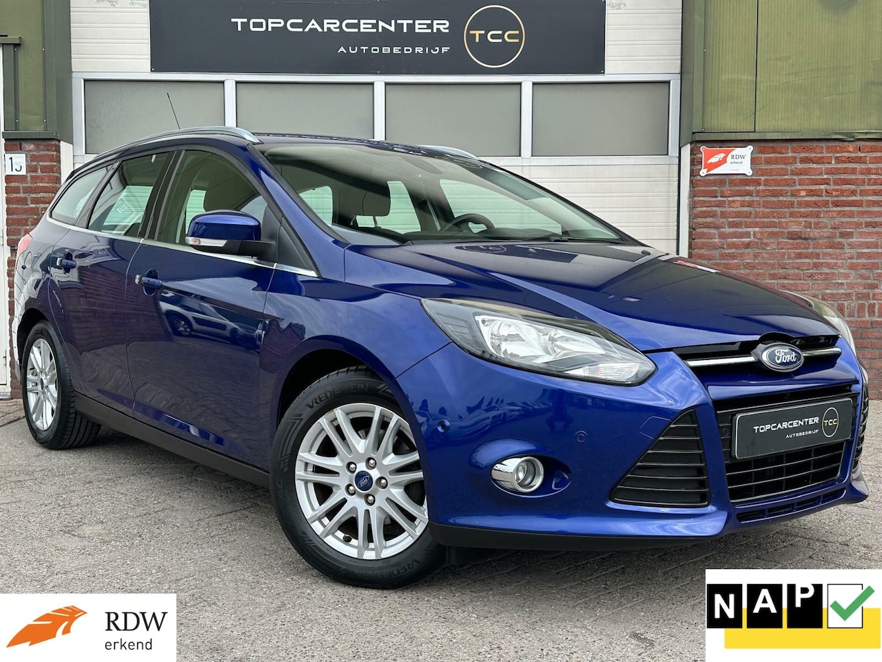Ford Focus Wagon - 1.0/AIRCO/TREKH/PARKS/NAVI/CRUISE/APK/NAP - AutoWereld.nl