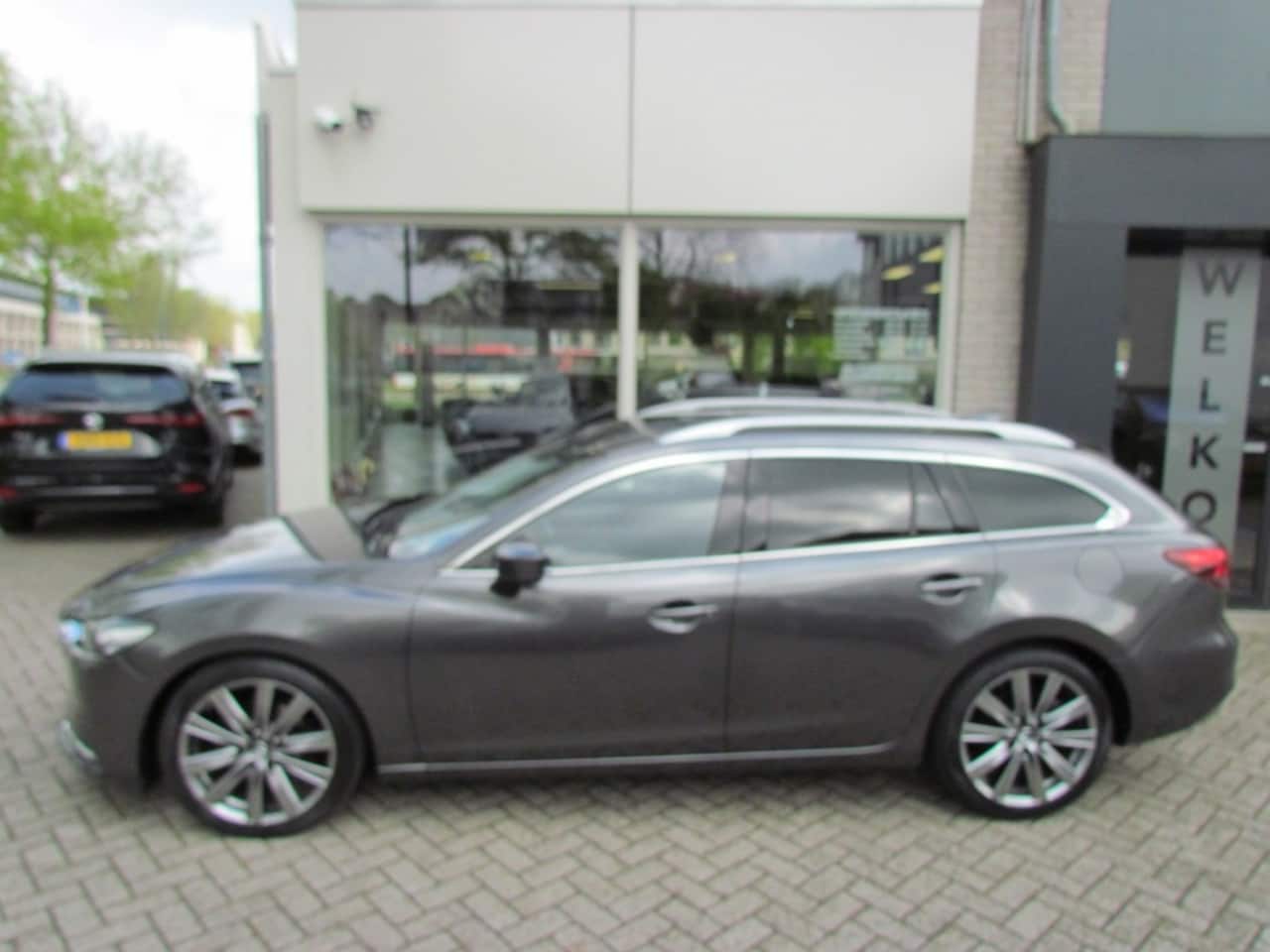 Mazda 6 Sportbreak - 2.0 Skyactiv-G 165pk 6AT Sportbreak Essence Aesthetic Choice Bla - AutoWereld.nl
