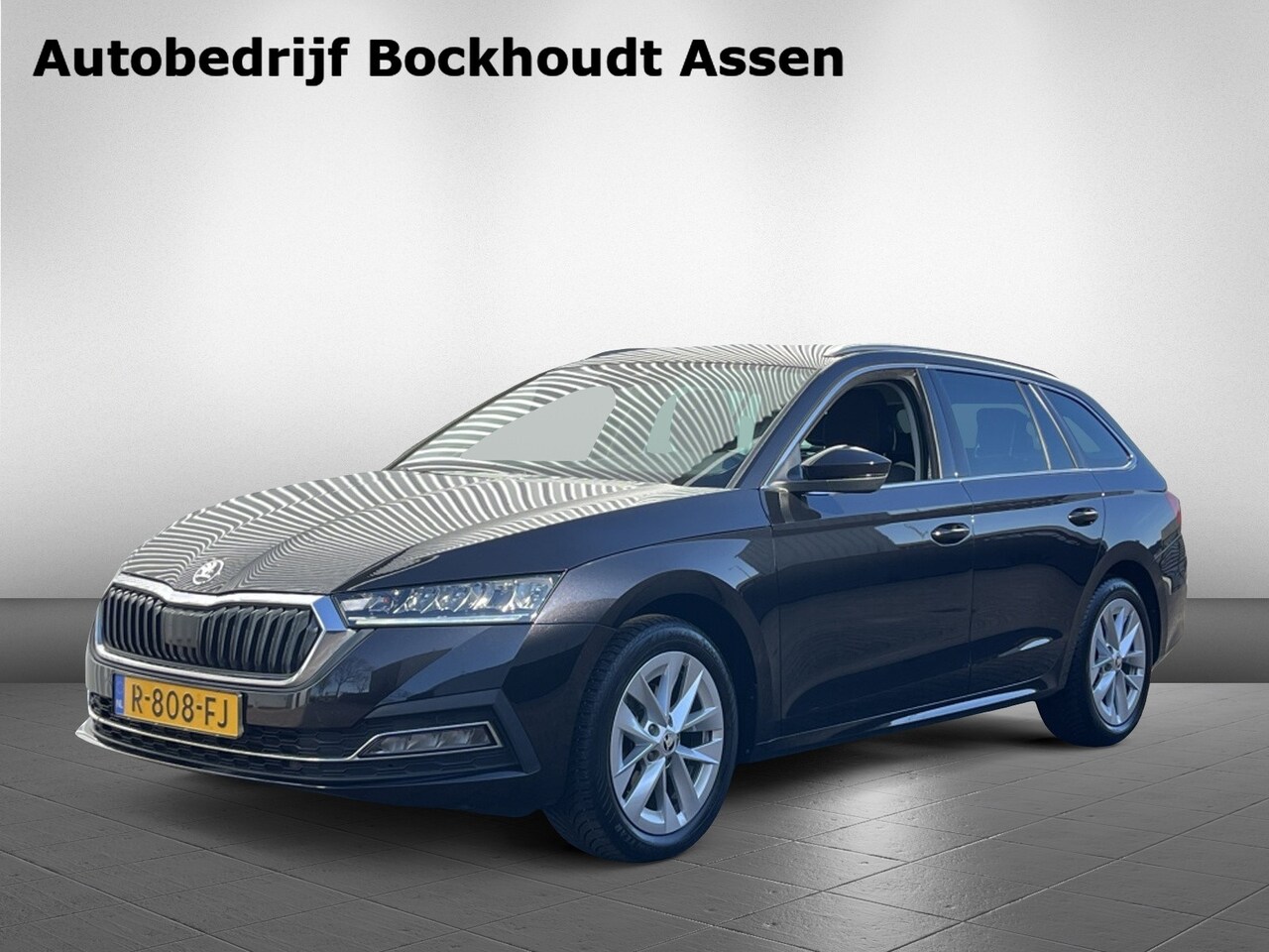 Skoda Octavia Combi - 1.5 e-TSI Business Edition | Climate Control | Camera | Apple Ca - AutoWereld.nl
